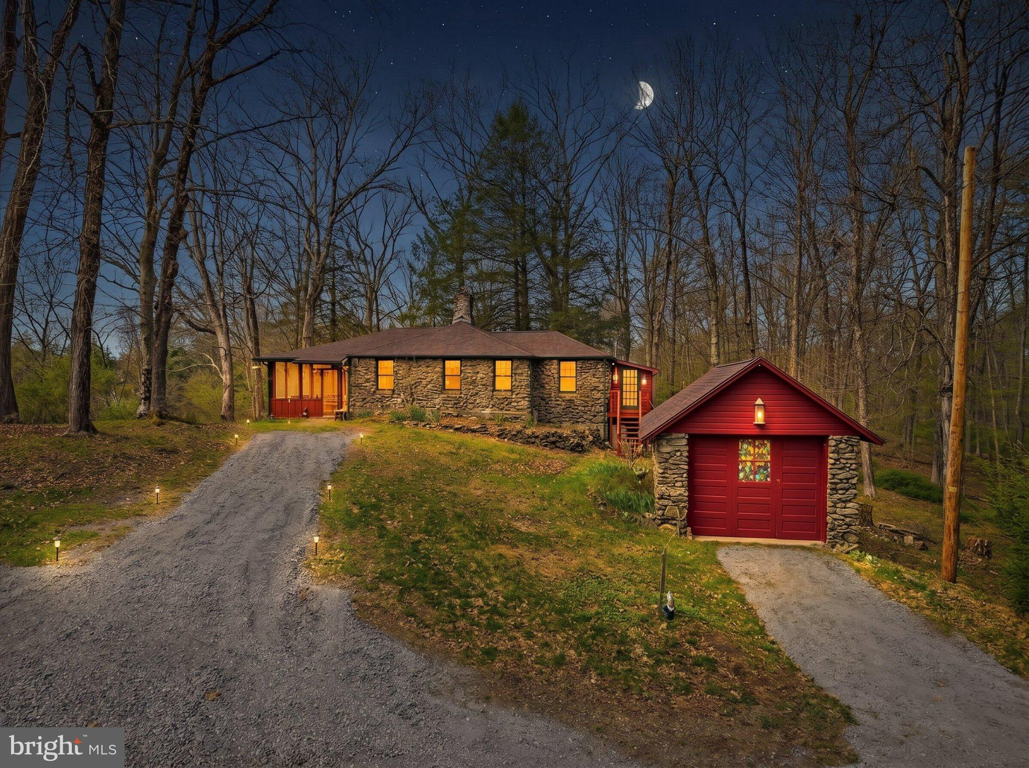 Tucked into a private, wooded setting in the Pocono Mountains, 248 & 250 Fenical Lane present a rare opportunity to own a true retreat defined by character, separation, and experience. Set across three parcels, this unique offering features two distinct stone cottages - Graystone and Tookstone - each positioned to create a sense of privacy while maintaining a cohesive, compound-style layout. Constructed with authentic stone and surrounded by natural landscape, the property immediately distinguishes itself from traditional residential offerings. A nearby water feature, mature trees, and the natural terrain create an environment that feels removed, yet remains accessible to the broader Pocono region. Across both residences, the property offers a combined total of 4 bedrooms and 3 full bathrooms, providing flexibility for hosting, extended stays, or multi-generational use. Graystone serves as the primary cottage with a 2-bedroom, 2-bath layout, while Tookstone complements the property with 2 bedrooms and 1 full bath, creating a secondary living space that expands how the property can be experienced. The cottages are supported by separate well and septic systems, a meaningful advantage that allows each structure to function independently. This level of infrastructure separation enhances usability and flexibility without the limitations often associated with shared systems. The true value of this property lies in how it lives. Mornings feel quieter. Evenings last longer. The separation between the cottages allows for connection when desired and privacy when needed, creating a balance that is increasingly difficult to find. Whether hosting guests, spending weekends away from the city, or simply enjoying a more intentional pace of living, the property adapts to a range of lifestyle needs. Located within reach of major routes and regional amenities, the property offers access to the outdoor lifestyle the Poconos are known for while maintaining the sense of seclusion that defines a true retreat. Total square footage reflects the combined living space of both cottages. Buyers are encouraged to verify measurements, parcel details, and permitted uses with the municipality. This is not a typical purchase - it is an opportunity to own multiple stone structures within a single private setting, offering a distinct and increasingly rare ownership experience. Properties of this scale, with two independent structures and infrastructure already in place, are increasingly limited in today’s market.