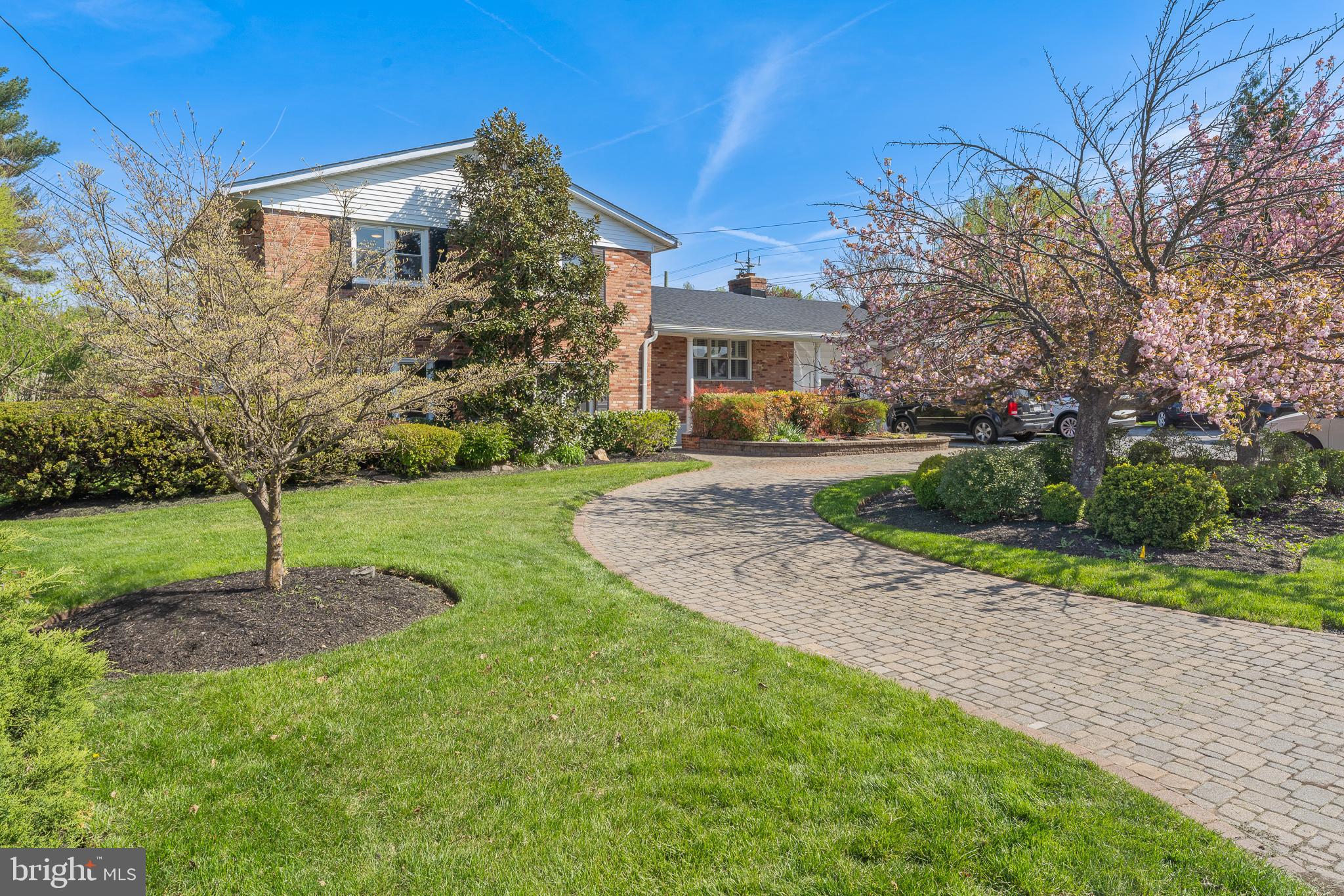 Beautifully Updated Split-Level Home with Private Professional Office Space!

Welcome to this stunning four-level split-level home, filled with natural light and thoughtfully updated throughout. The spacious, light-filled living and family rooms feature gleaming hardwood floors and expansive windows overlooking a private backyard—perfect for everyday living and entertaining.

The fully renovated kitchen offers both style and functionality, featuring hardwood flooring, white cabinetry, granite countertops, a breakfast bar, and high-end stainless steel appliances including a gas cooktop, wall oven, microwave, and oversized refrigerator. It opens seamlessly to the comfortable family room for easy gathering.

Upstairs, you’ll find three generously sized bedrooms and two full baths, including a spacious primary suite with a private en-suite bathroom.

The lower level provides flexible space ideal for an exercise room, hobby area, or recreation space, complete with backyard access and a dedicated laundry/utility room.

A unique highlight of this property is the professionally finished office suite—currently configured as a dental practice. It includes a welcoming reception and waiting area, two patient rooms, a large office/storage space, and a half bath. This versatile space is perfect for medical, dental, legal, or accounting professionals seeking a home-based practice with excellent visibility and ample parking. Alternatively, it can be easily transformed into a private in-law, nanny, or guest suite.

The possibilities are endless in this beautifully maintained, multi-functional home!