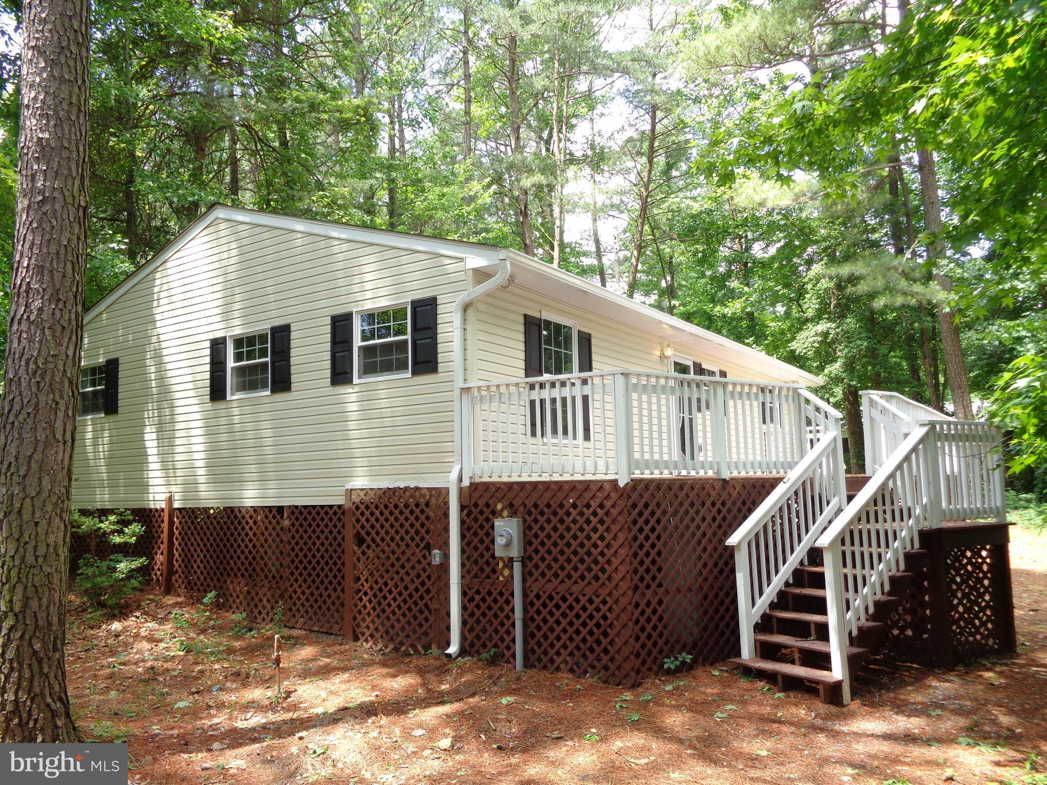 -->ZERO DOWN PAYMENT ELIGIBLE<--JUST MOVE IN & RELAX!!! ENJOY THE SPACIOUS GREAT ROOM, BBQ WITH FRIENDS ON THE HUGE DECK, ROMP THE BACK YARD OR RETREAT TO THE PRIVATE MASTER SUITE...FROM THE GLEAMING WOOD FLOORS TO THE COMPLETELY NEW KITCHEN (WITH STANLESS APPLIANCES & GRANITE COUNTERS) TO THE BEAUTIFUL NEW TILE BATHS, YOU'LL BE IMPRESSED! WINDOWS & HVAC REPLACED FOR EXTRA VALUE!