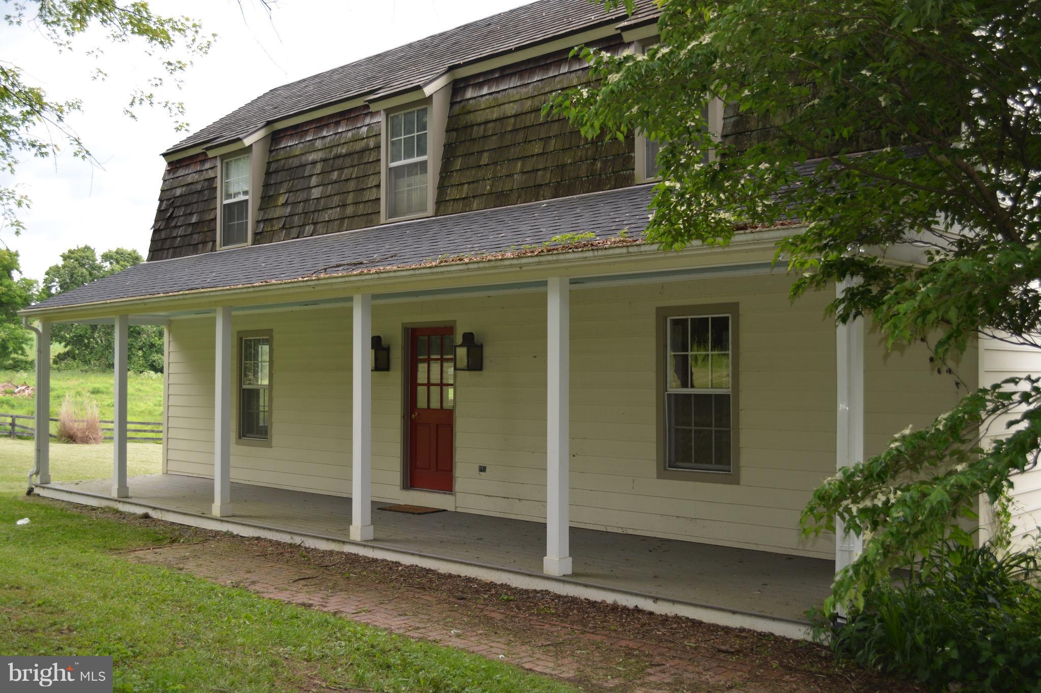 Charming home at the very end of a long lane, backs to 100s of acres. Renovated in 2015 w/ new kitchen cabinets, stainless steel appliances, and granite counters. Hardwood floors thru-out, 1st floor office, large living and dining rooms, 3 upstairs bedrooms w/2 baths & laundry, covered & open decks, Covered front porch, large family room w/ fireplace. Well proportioned rooms, beautiful setting.