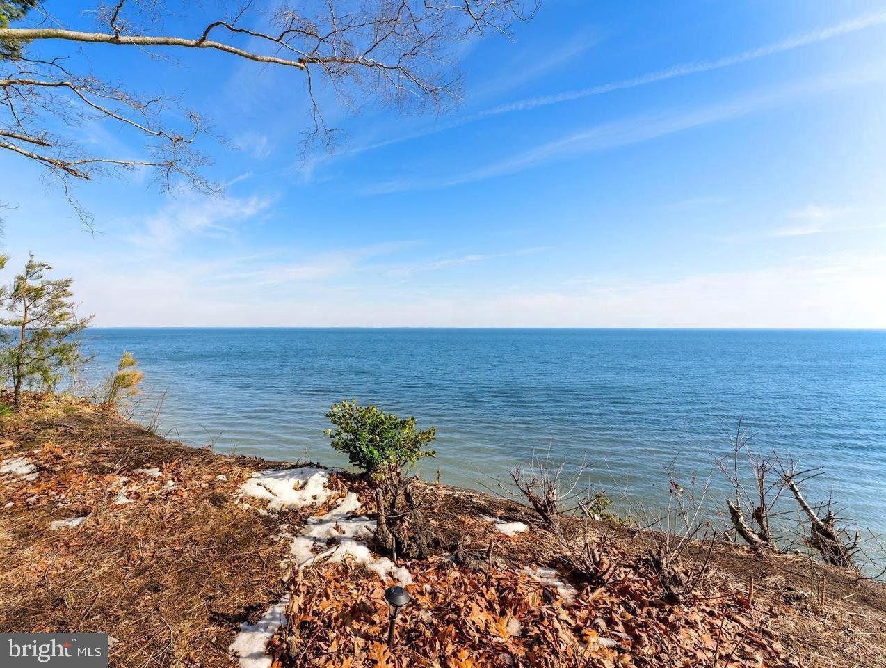 This rare large waterfront lot with spectacular views is located in the desirable water-privileged community of Chesapeake Ranch Estates, offering access to 2 private Chesapeake Bay beaches Driftwood Beach and Seahorse Beach, Lake Lariat, hiking trails, and a variety of outdoor recreational amenities. Residents enjoy community features including playgrounds, athletic courts, a campground, and private security patrol. Conveniently located near shopping, dining, and Solomons Island, this property provides the perfect blend of natural surroundings and everyday convenience. Enjoy year-round living or a relaxing weekend retreat in this amenity-rich community.