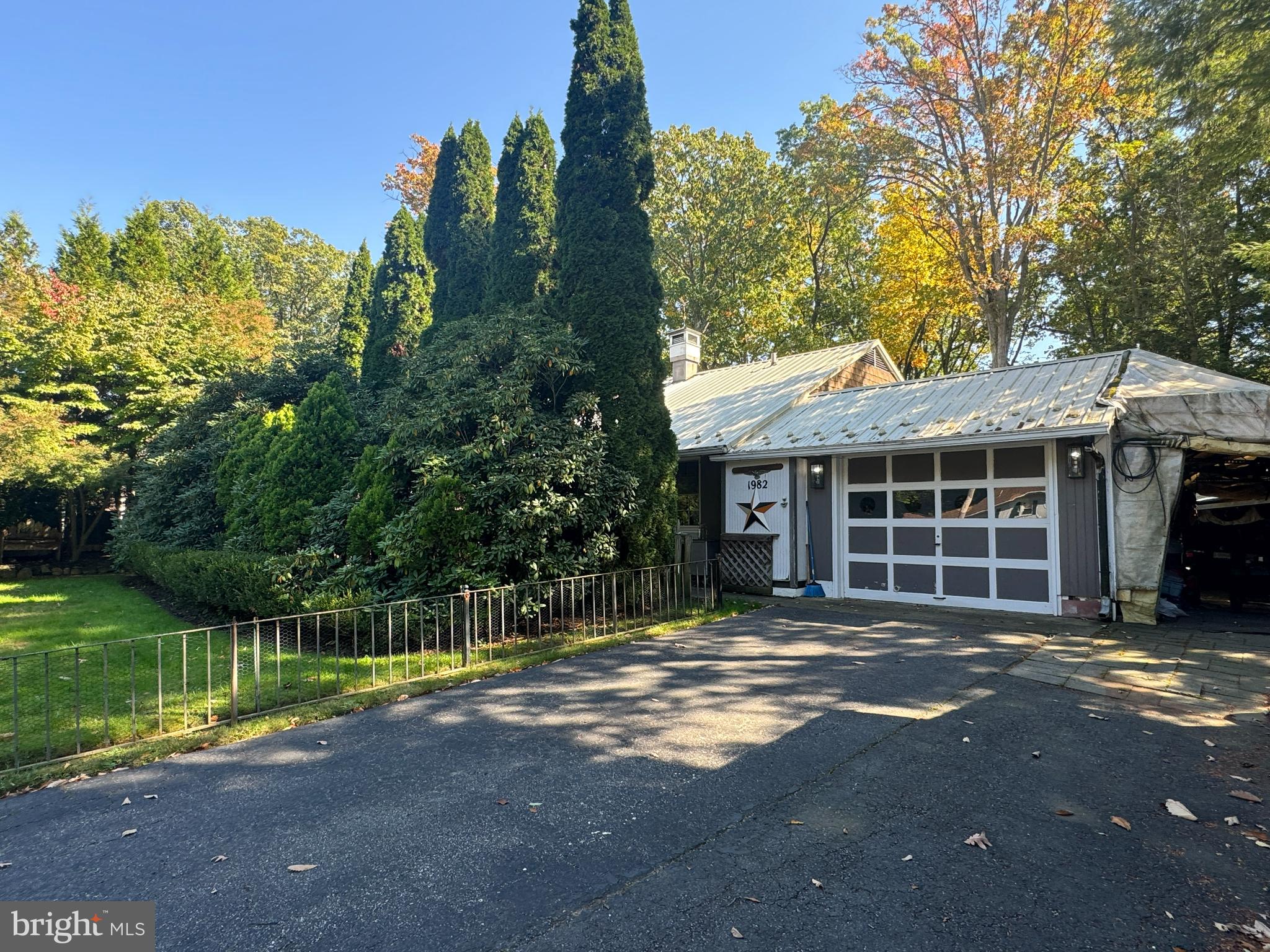Welcome to this cozy 3-bedroom, 1-bath home nestled in the desirable Park Forest neighborhood. Offering 1-floor living, this 1,073 sq. ft. home is waiting for your personal touch. The back of the home features a bright sunroom as a peaceful retreat. Perfect for enjoying the hot tub, your morning coffee or unwinding after a busy day. The spacious, flat yard is ideal for outdoor enthusiasts, with plenty of greenery and trees including a stunning Japanese Maple and Dogwood. The  mudroom provides plenty of space to keep things organized and the attached garage adds convenience and additional storage. This home is full of potential to make the home of your dreams with it's inviting layout and excellent setting. Don’t miss the opportunity to own a piece of Park Forest and make this house your own! Close access to amenities for restaurants and shopping. Less than 7 miles from Beaver Stadium at PSU!