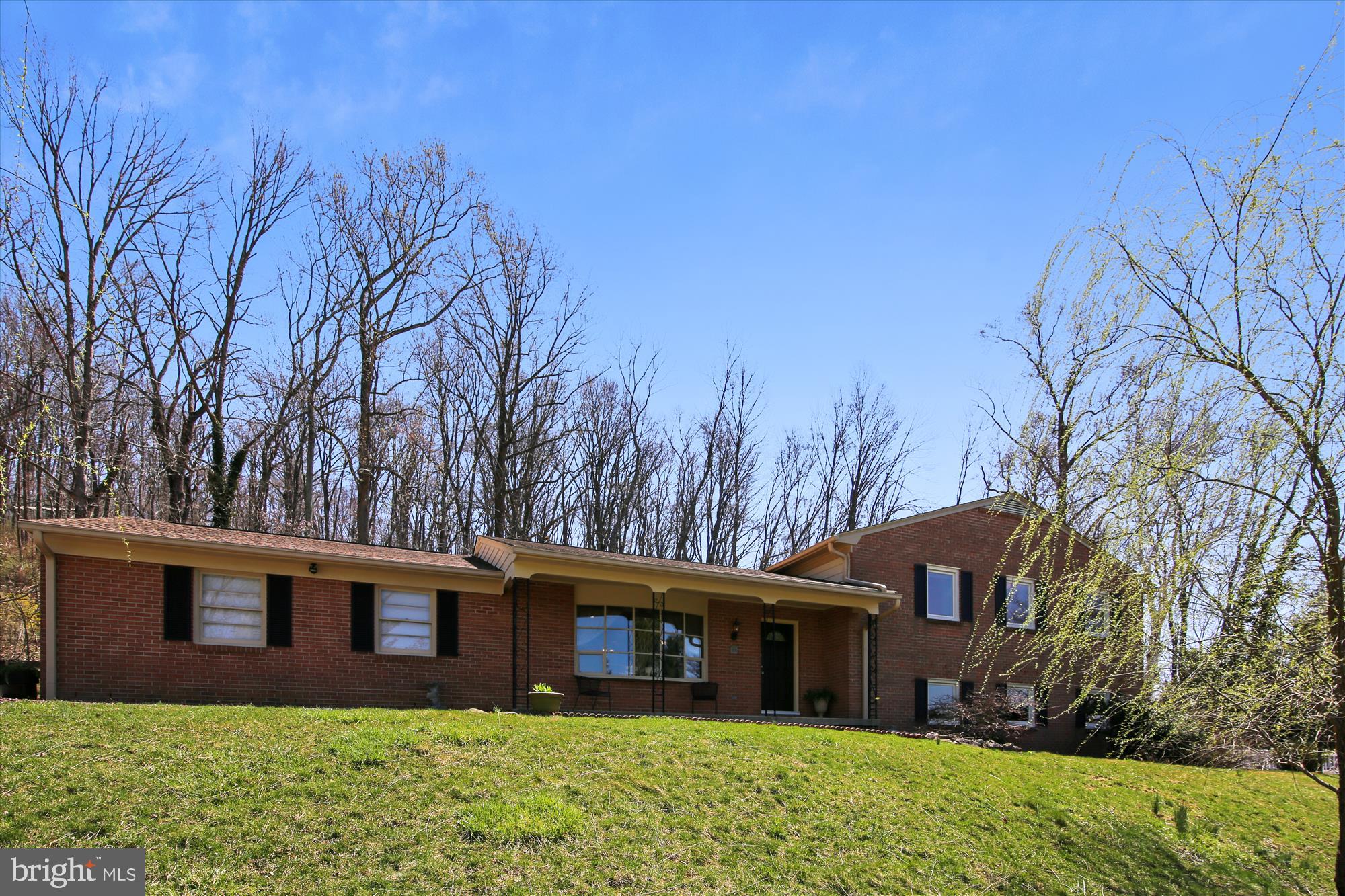 Wonderfully updated all brick home with 4-levels of living, 3+ bedrooms and 2.5 baths.  Newer roof and gutters/guards (2014/2020).  Heat Pump system (2019).  Renewal by Anderson windows.  The openness of the kitchen along with the expansive island with breakfast bar provides additional storage plus more countertop space--ideal when hosting family and friends.  The large bow window fills the room with natural light and the open dining area can easily accommodate your holiday expanded tables and chairs (even the kids' table!).  Hardwood floors span the main and bedroom levels.  The Family Room includes a wood burning brick fireplace and French doors that lead to the side yard and pool just beyond.  The Rec Room in the basement level provides a secondary family room and would make a great media space.  There is also a finished room off the laundry area.  This flex area could be used as a home office, gym,  4th bedroom or be converted into a Pinterest inspired mud room that serves as the entrance when using the pool…you choose!  Expand your living space outdoors where you can appreciate the freedom  3+ acres brings you.  Multiple patios, private balcony off the Owner’s bedroom, poolside deck…all ideal spots to enjoy the beautiful views of the mountains, breathtaking sunsets and the occasional firework displays from the City of Hagerstown.  Peaceful country living yet convenient to Rt 40, I-70 and 2.5 miles from the Myersville Park & Ride (direct route to Shady Grove Metro).  No HOA.  Desirable Myersville/Middletown School District.  Lovingly maintained by the Owner and ready for you to call home. **Check out the interactive floorplan**