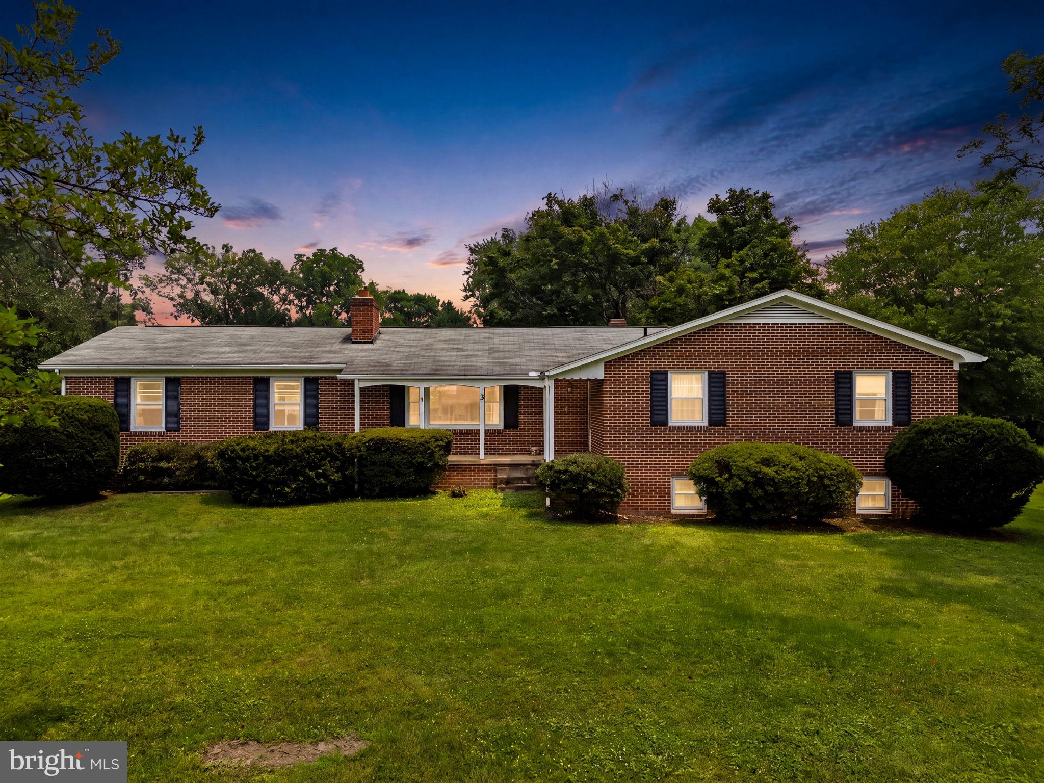 Welcome to Hamilton, where the world slows down just a bit and life feels a little sweeter. ✨ This well-built, all-brick rancher sits on a spectacular 1.86-acre lot and offers a rare opportunity to create your dream country homestead! Offered as an estate sale and sold strictly AS-IS, this home has been lovingly and meticulously maintained over the years and is entirely comfortable and livable today—allowing you to move right in and take your time making updates. Giving you all the feelings of pure nostalgia, it holds tons of potential for the savvy buyer! 🏡🔨 Inside, you will find a fantastic floor plan designed for easy, main-floor living with classic hardwood flooring throughout that radiates warmth and timeless character. Need a little extra space? The partially finished basement offers the perfect canvas for a recreation room, home office, or workshop! Plus, with Comcast high-speed internet available, this property is completely ready for your work-from-home needs! 💻📞📈 Outside, the property features a paved driveway leading to a fantastic oversized 2-car garage with plenty of room for vehicles and projects. Need more storage? Two spacious storage sheds convey, perfect for all your lawn equipment and tools! 🚜🔧 Imagine taking a peaceful evening stroll down Main Street, stopping at the local park, and waving to friends and neighbors along the way. 🌳🚶‍♂️ Situated in the highly desired Hamilton Elementary School district, this home offers that perfect, close-knit small-town community feel. The expansive, private acreage means plenty of room to garden, play, or relax, all with NO HOA restrictions! Plus, you are just minutes away from Purcellville for all your grocery stores, shopping, and dining needs, and the iconic W&OD trail is nearby. 🚲🌾 A solid brick home with unparalleled land, great bones, high-speed connectivity, and that perfect, nostalgic small-town charm. Bring your design ideas and make it your own! Schedule your tour today and welcome home! 🗝️❤️🍂