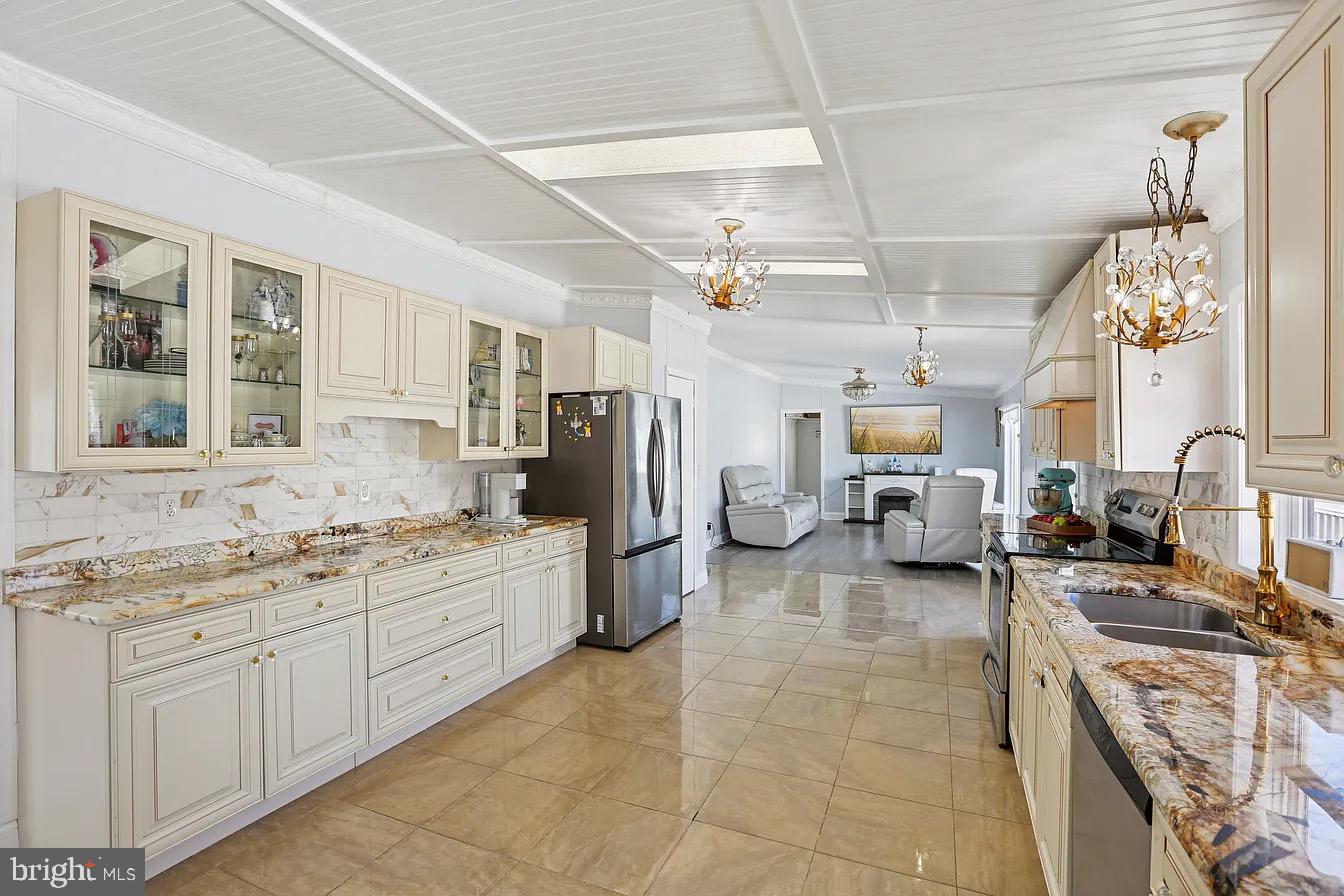 Welcome to 12 Little John Ct., where space, comfort, and value come together. This beautifully maintained 4-bedroom, 2-bath home offers over 2,100 square feet of single level living, making it one of the largest homes in the community.

The heart of the home is the updated kitchen, featuring modern finishes, abundant cabinet space, and an open layout that flows seamlessly into the main living areas. Perfect for entertaining or everyday family life. The flexible floor plan provides generous sized bedrooms, multiple gathering spaces, and room for a home office, playroom, or hobby area.

Situated on one of the largest lots in the community, you'll enjoy extra outdoor space that's hard to find, along with private driveway parking and a convenient location just minutes from shopping, restaurants, Route 40, and I-95.

Whether you're looking for your first home, need more room for a growing family, or simply want affordable one floor living without sacrificing space, this home is a must-see.

Buyer must obtain community park approval. This must be a cash sale or financed through personal loan. APGFCU offers loans specifically for this.