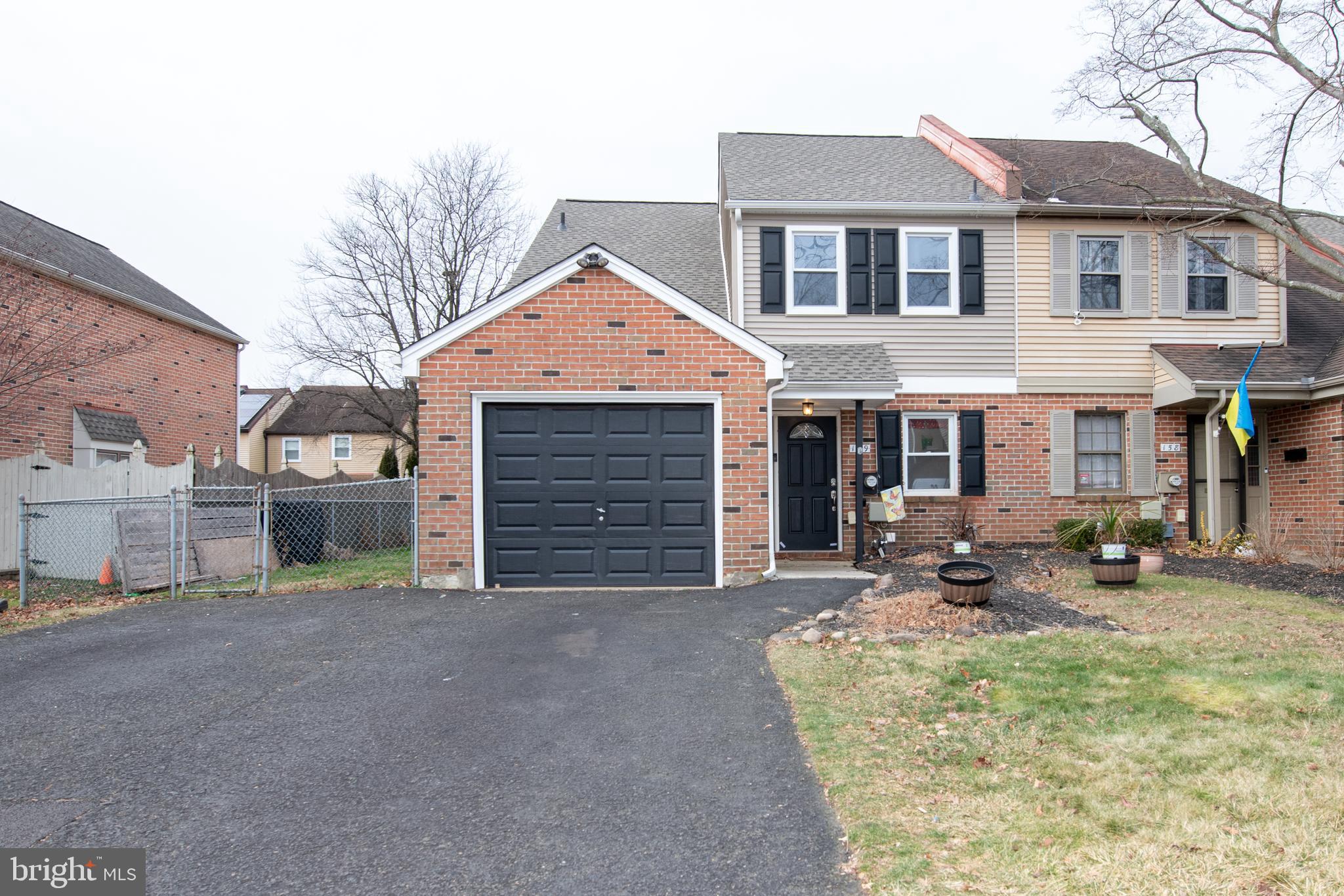 Amazing Large End Unit Townhome in Langhorne that boasts 3 bedrooms, 2.5 baths, and has an oversized attached garage! The covered front Entry protects you from the rain and snow. As you enter the home there is a foyer area with a hallway that leads you to a Powder Room, a Laundry Room, and inside access to your garage. The very large Living Room has recessed lighting, laminate flooring and a sliding glass door to rear yard. The Eat-in-Kitchen has a double window with a seat area, dishwasher and newer range/oven. The Dining Room has recessed lighting and a Brick Fireplace, or if you prefer use this room as your Den. The second floor offers a spacious Master Bedroom with a ceiling fan, a Master Bathroom, laminate flooring, a huge walk-in closet. There are Two more very nice sized bedrooms, and a Full Hall bathroom that has a tub/shower on the second floor. Your back & side yards are completely fenced in and there is a nice patio area. The Roof, decking, siding, and Shutters were all replaced in the Fall of 2023. The HVAC system in 2016, water heater in 2017, and there is an expanded driveway. This is a fantastic location within the neighborhood with Tareyton Park at the end of the street. This home is just waiting for its new owners. Easy access to I-95, Turnpike, Route 1, Shopping, Hospital, Entertainment and Dining. Make this the first home on your to-see list!  Professional photos by the end of next week.
