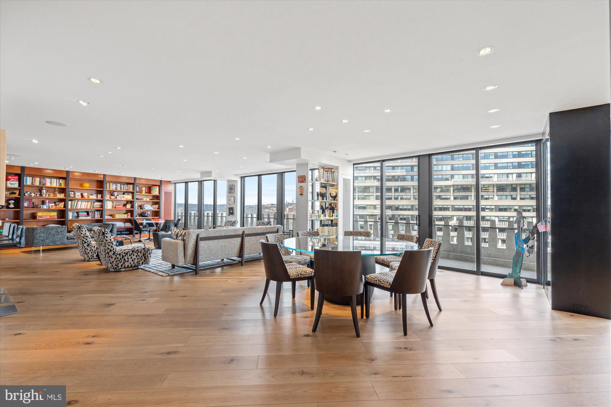 An amazing two bedroom unit with a breath taking Potomac River view. This amazing residence at Watergate South features two combined units spanning over 2,750 square feet of spectacular living space.

Beyond the brand new floor-to-ceiling glass sliding doors is the 75 foot balcony that spans across the entire home with unmatched westward-facing views that showcase dramatic sunsets over the Potomac River and Key Bridge. 

Upon stepping into the spectacular foyer, it is immediately apparent that this is a home rarely found. A complete renovation in partnership with world-renowned designer, Victor Shargai, introduced all of the latest luxuries to his personal residence, perfect for intimate family living or large-scale entertaining. Polished limestone floors seamlessly meet with two mirrored walls, designed to capture every ounce of the stunning river views. Rift-cut natural maple built-ins expose their grain. Swivel lighting installed throughout highlights works of art, while motorized shades automatically reveal the views revealing new double-pane windows and doors and streaming sunlight across the sound-absorbing natural white oak 7” floors. The shades and full LED recessed lighting are wirelessly controlled via Lutron HomeWorks and complement the sound system to create a thorough smart home. The modern kitchen with newly installed new cabinet doors, separated from the open and expansive living space by custom designed steel and glass doors, features Calcutta Gold marble countertops and custom cabinets concealing a Sub-Zero/Wolf appliance suite. Adjacent to the kitchen, the stylish bar is lined with designer fabric panels and holds three beverage coolers. The dual primary bathrooms are finished to the highest standard, lined with Thassos White and Nero Marquina black marbles. Grohe fixtures, Toto toilets, heated floors, and showers with body sprayers serve to create a most special spa-inspired experience. Storage abounds, with concealed spaces throughout with specially placed electric outlets and twin walk-in closets in the owner’s suite. An in-unit new Miele washer/dryer, two parking spaces, and two additional storage spaces are also included. 

It is not a surprise that Watergate has accumulated such a luxurious reputation. With unparalleled amenities, priceless views, and within an iconic location, Watergate #709 sets the bar for relaxing and incredibly enjoyable city living.