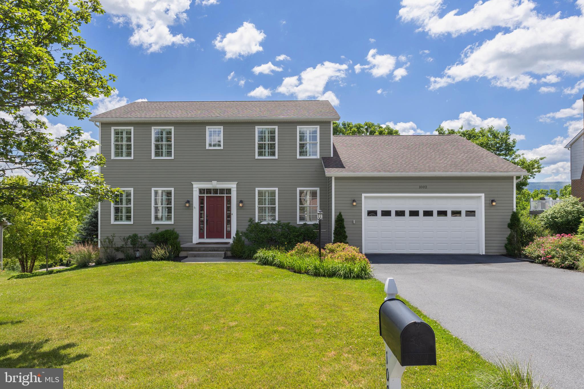Every detail shines in this beautifully updated, meticulously cared for two-story home!
Gleaming hardwood floors, expansive windows with high-end wooden shutters, and quality updates set the tone throughout. The eat-in kitchen serves as the heart of the main floor, featuring a modern design with a breakfast bar, sleek stainless steel appliances and plenty of room for casual dining. It flows effortlessly into the living room, where a cozy fireplace creates a warm and welcoming focal point. Step outside to the composite deck and take in the Mt. Nittany views, perfect for morning coffee or evening unwinding. An office and separate dining room add versatility to the floor plan, ideal for work and entertaining. The main level is completed by a half bath, a laundry and mudroom, and access to the attached two-car garage. Upstairs, the primary bedroom features a private bath with modern finishes
and a glass-enclosed shower. Three additional bedrooms and a second updated full bath complete this level. A finished walkout lower level expands the home's living space with a spacious family room, fifth bedroom, and full bath. Well suited for guests or extended family, this flexible area easily adapts to different lifestyle needs. In Centre Hills Village, enjoy a peaceful neighborhood setting near Shamrock Park, with Centre Hills Golf Course, Penn State, and more just minutes away—don’t miss this opportunity.