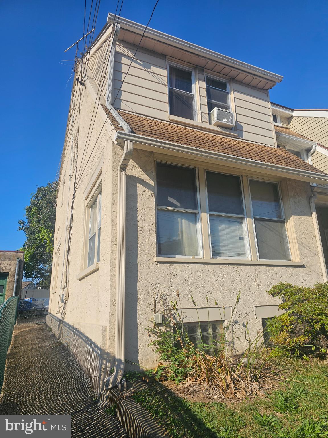 Nestled in the charming neighborhood of Clifton Heights, this exquisite end-of-row townhouse embodies the perfect blend of classic elegance and modern comfort. Built in 1920, this Colonial-style residence invites you to experience a lifestyle of sophistication and warmth. Step inside to discover a beautifully designed interior featuring rich hardwood floors that flow seamlessly throughout the main living areas. The traditional floor plan offers a sense of spaciousness, perfect for everyday living. Natural light pours in through the windows, creating a bright and airy atmosphere that enhances the home's inviting charm.  The dining area is perfect for gatherings, fostering connections and memories with loved ones. Retreat to the three generously sized bedrooms, each offering a peaceful sanctuary for rest and relaxation. The home features one full bathroom and an additional half bath, providing convenience for both residents and guests. For those who appreciate outdoor living, the property offers a quaint outdoor space, ideal for enjoying morning coffee or evening sunsets. While there is no dedicated parking, the urban location provides easy access to nearby amenities, shops, and dining options, allowing you to immerse yourself in the vibrant community. The unfinished basement presents an opportunity for customization, whether you envision a cozy home gym, a creative studio, or additional storage space. With its blend of historic charm and modern potential, this home is a canvas awaiting your personal touch. Experience the exclusive lifestyle that Clifton Heights has to offer, where urban convenience meets the warmth of a close-knit community. This residence is not just a house; it's a place to call home, where every corner invites you to create lasting memories. Embrace the opportunity to make this exceptional property your own. New heater installed.