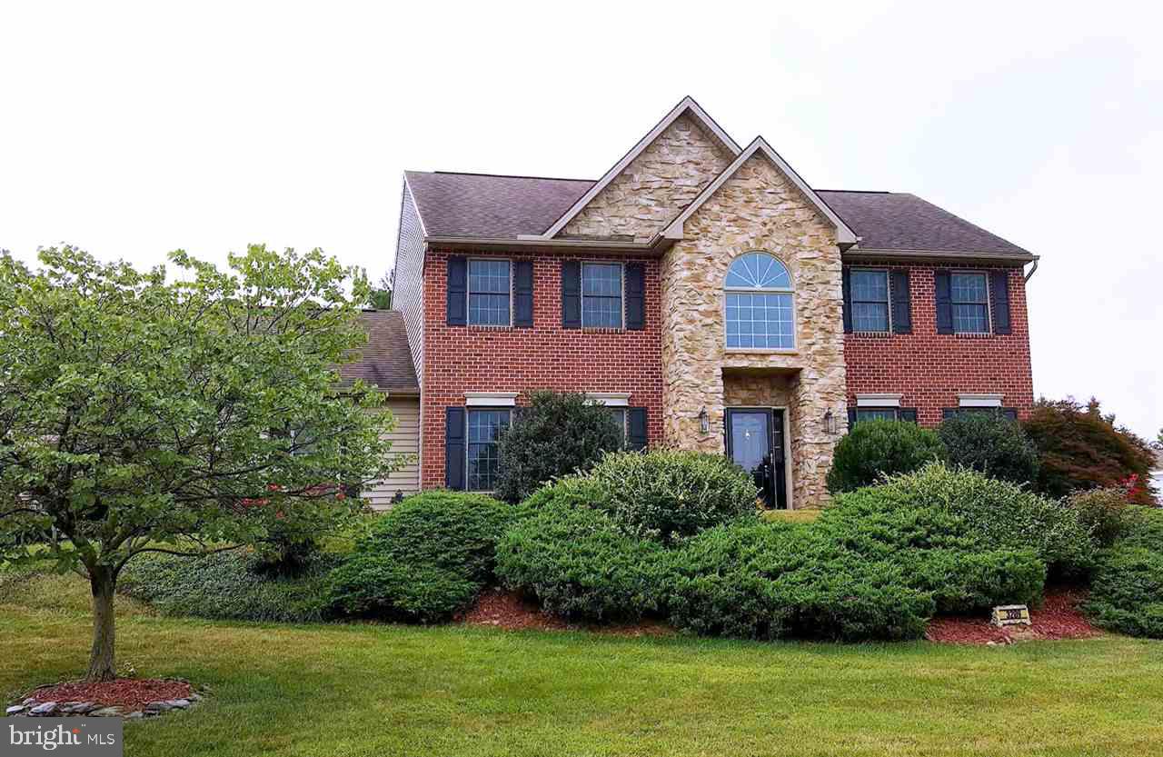 Beautiful landscaping surrounds this spacious colonial. Enjoy the terraced gardens from your deck or gazebo, walk to the local park & play some tennis, or entertain in the open first level of this elegant home. This home features 4 spacious bedrooms, an open kitchen w/42" cherry cabinets, family room w/gas fireplace, all only minutes from the MD/PA line and I83