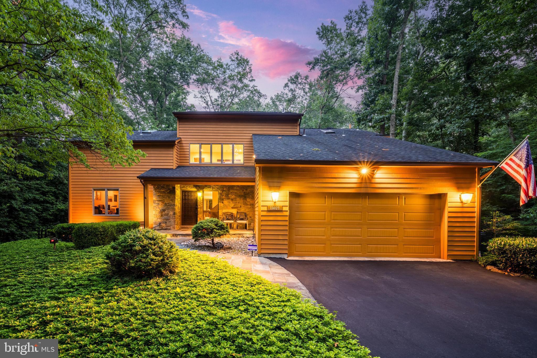 Live work and play! This fantastic new listing in Reston has it all. This five bedroom, four full bath contemporary home located on one of Reston's premier addresses offers sanctuary and a private oasis, but is also just around the corner from shopping, amenities and major transportation routes. In fact, it is only a five-minute drive to the metro and 15 minutes to Dulles airport. This entire home has recently been painted with custom designer colors. The floors on the main level and upper level are mostly hardwood. The lower level flooring is luxury vinyl tile. The gourmet kitchen has recently been updated with gorgeous quartz countertops, a lovely custom backsplash and stainless appliances. The baths have been updated/renovated as well. If you like natural light, you will love this home. Its numerous and large windows ensure plenty of natural light indoors. You will love the large, traditional red cedar sauna located in the lower level. But let's talk about the yard. This amazing home has a true resort style backyard. The large heated pool extends your swimming season into the spring and fall. It has an automated pool cover that provides security for small children and keeps the water warm and clean. There are lush, evergreen trees and shrubs surrounding the backyard to keep it completely private in all seasons. Can you believe a half acre wooded right in the middle of Reston? Amazing. The natural stone patios and deck offers outdoor space for activities all year and you will never lose electricity with a whole house Generac powered generator. With no through traffic it's an ideal neighborhood for privacy and safety. This home offers unmatched serenity and peace on an incredibly private lot. Be prepared to fall in love with this home!