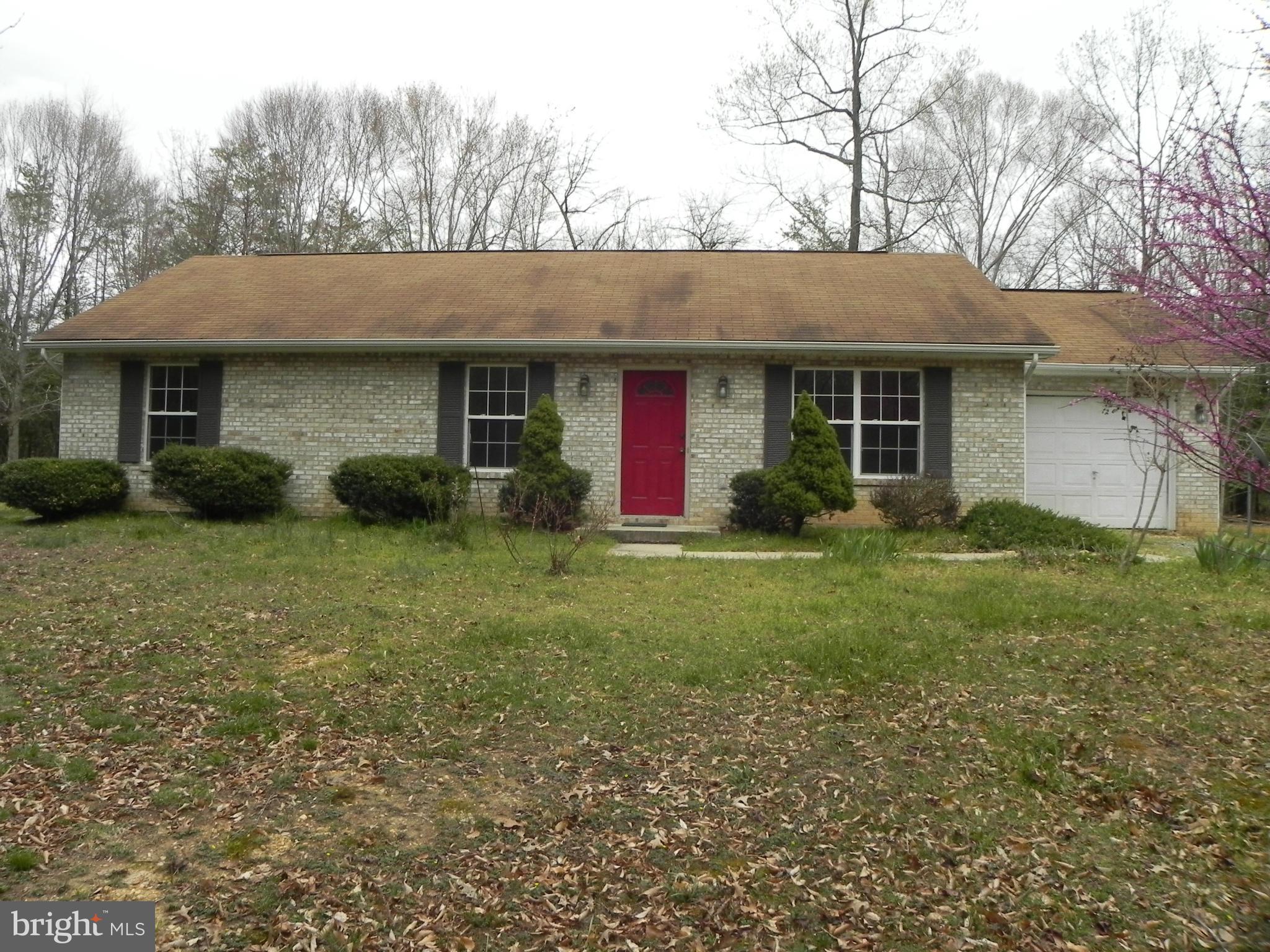One Story living in the country. Rambler w/ 3 bedroom 2 bath living room, one car garage, on 3.3 acres. Kitchen and dining area. Sliding glass door to rear of home. Private Road to home.  In the country but close to La Plata and Indian Head. All electric home. well maintained. You won't find a better home than this at this price. HSA Warranty.