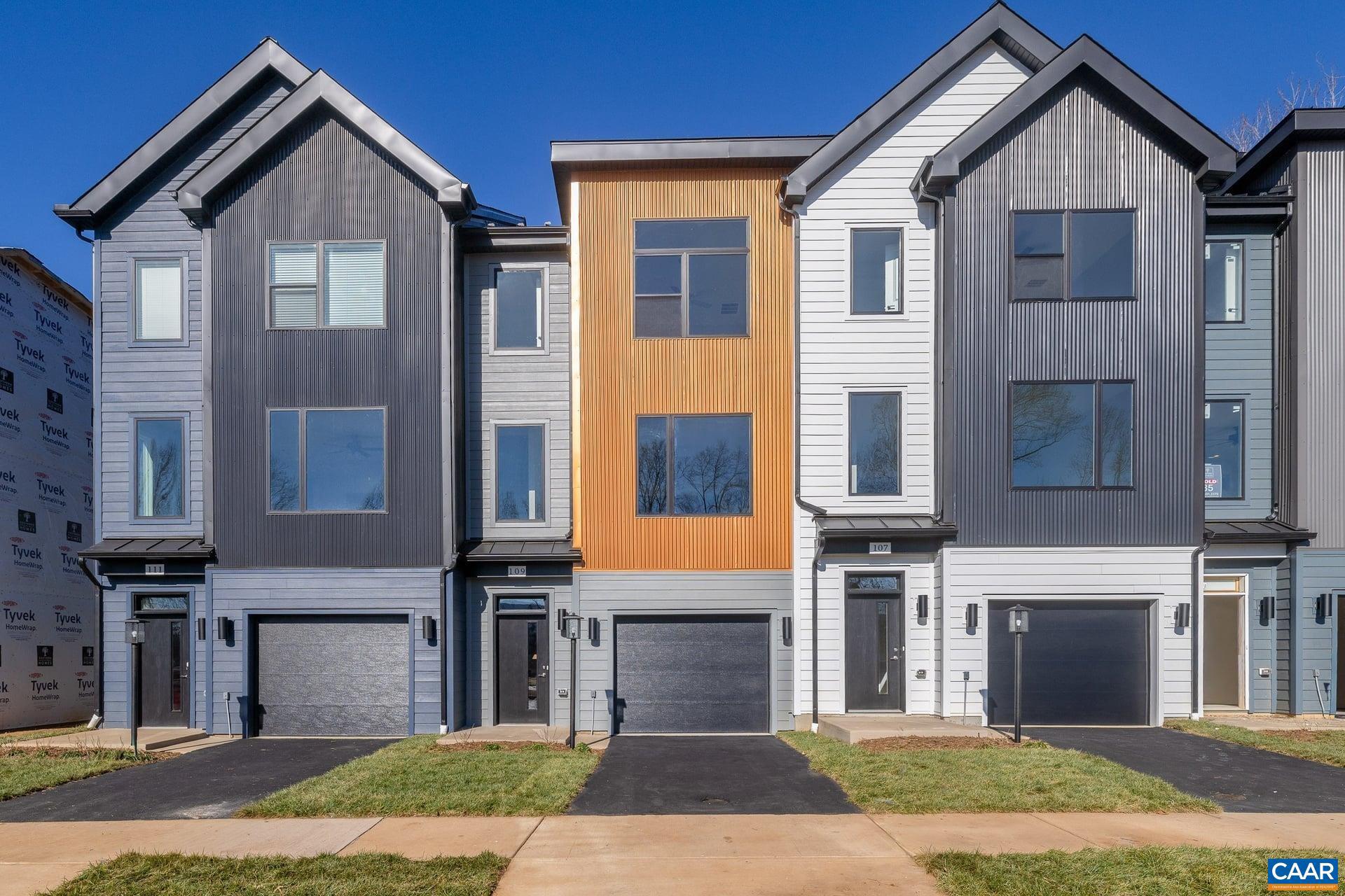 Under construction for July delivery. Welcome to urban living at its best! Located less than a mile from the University of Virginia Medical Center, Scott Stadium, public transportation, and minutes to Downtown Charlottesville, the new neighborhood of Flint Hill is all about city living! The Hinton is a contemporary townhome with a clean, modern exterior designed to feel cohesive and inviting. The entry-level features a finished bedroom and full bath, offering a comfortable and private space for guests, a home office, or additional living flexibility. This level also includes a convenient 1-car attached garage. The main level offers an open-concept design perfect for everyday living or entertaining. The kitchen is beautifully appointed with granite countertops, and stainless steel appliances. A rear deck extends the living space outdoors, offering an easy transition for relaxing or entertaining. The upper level features a spacious primary suite with a vaulted ceiling, a large shower and ceramic tile accents in the primary bath. Two additional bedrooms, a full bath, and a dedicated laundry room complete this thoughtfully designed home.,Granite Counter,Maple Cabinets,White Cabinets