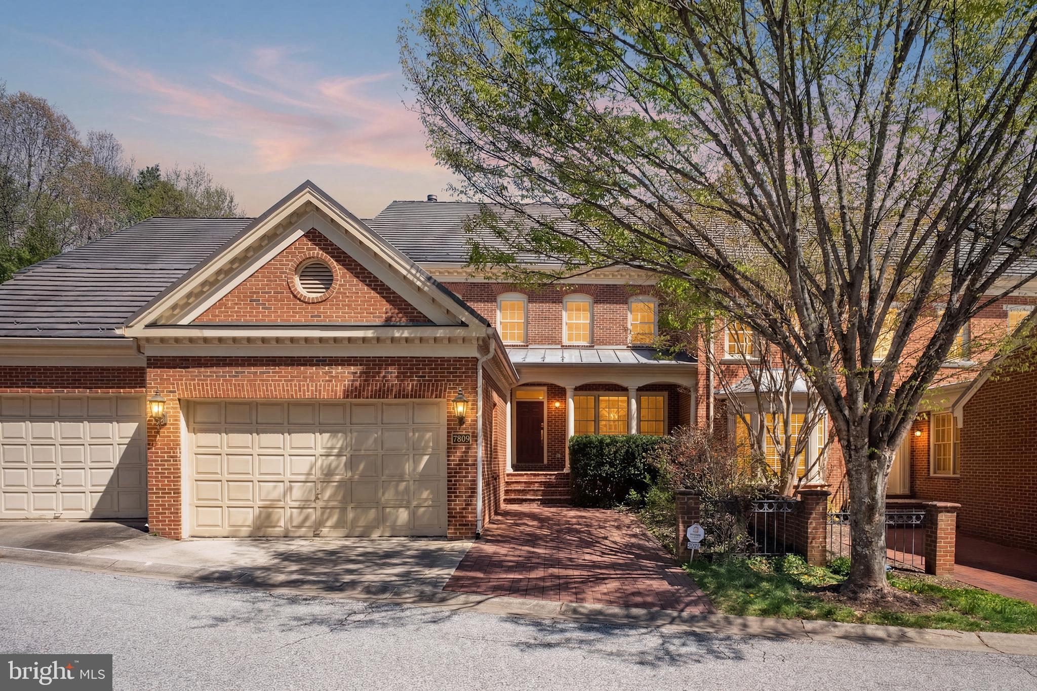 Welcome to this masterfully crafted, all-brick residence in the prestigious River Falls community. Offering over 4,500 square feet of finished living space, this home showcases a distinctive layout by renowned builder Gosnell—combining the spacious feel of a single-family estate with the low-maintenance convenience of luxury townhome living. The Gosnell hallmark of quality is evident throughout, from solid construction to refined interior finishes.

The main level features soaring ceilings, elegant moldings, and high-quality hardwood flooring. A gracious foyer opens to a grand dining room and a sun-filled living room, creating an inviting space for both everyday living and entertaining.

The home flows seamlessly into a bright breakfast area and a chef’s kitchen equipped with a Sub-Zero refrigerator, Viking range hood, center island, newly updated five-burner cooktop, and abundant cabinetry. The gourmet kitchen connects to a warm and inviting family room anchored by a gas fireplace.

Upstairs, the expansive primary suite offers peaceful views of the private patio and includes a dressing area, two walk-in closets, and a beautifully updated, spa-like en-suite bath. Two additional bedrooms share a Jack-and-Jill bath, and a conveniently located laundry room completes the upper level.

The walk-out lower level provides exceptional flexibility, featuring a spacious recreation room that opens to a charming Georgetown-style brick patio. This level also includes a fourth bedroom or office, a full bath, and generous storage space—ideal for a home gym or additional living needs.

A two-car garage is equipped with a high-speed EV charger.

The professionally maintained community landscaping offers lush greenery and exceptional curb appeal year-round. Residents enjoy access to a clubhouse, swimming pool, six tennis courts, a playground, and expansive fields for soccer, baseball, and lacrosse.

Ideally located for outdoor enthusiasts, the home is just a five-minute walk to the scenic trails of Great Falls and the C&O Canal.

Commuting is effortless with direct access to downtown Washington, DC via the scenic Clara Barton Parkway—no interstate required.

Perfectly situated, the home is only 10 minutes from the premier shopping and dining of Tysons Corner and a short, picturesque drive to historic Georgetown.

Located within the highly sought-after Carderock Springs, Pyle, and Walt Whitman school district.

Beautifully maintained and truly move-in ready, this is a rare opportunity to own a distinguished home in one of Potomac’s most desirable and accessible communities.