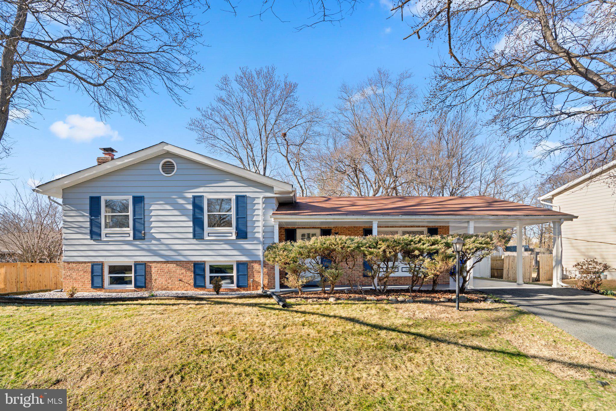 Welcome to this charming home nestled near an extension of Seneca Park! This three-level residence boasts 3 bedrooms, 3 full baths, and hardwood floors throughout. The living, dining, and kitchen areas seamlessly flow for both daily living and special occasions. The kitchen is equipped with modern stainless appliances, expanded cabinetry, Corian® countertops, and a Broan® range hood extractor for efficiency. Enjoy easy access to the deck and yard, perfect for entertaining.

The lower-level multi-purpose room features a brick wood-burning fireplace, shelving with new flooring, and provides a cozy retreat. Temperature control is a breeze with individually controlled baseboard heating for freezing temperatures, central heating for milder weather, and central air conditioning for warm seasons. Storm windows and doors are installed throughout for added comfort.

The home also features a convenient mud/mechanical room with cabinets, commercial-grade washer/dryer, and water heater. The Trane HVAC system with humidifier and UV light ensures optimal climate control. Recent upgrades include a new lightning rod meeting code, and replacements for water, sewer, electrical panel, and roofing.

For your connectivity needs, Xfinity®, FIOS®, and satellite options are available. Additional highlights include a spacious all-wood storage shed with an outdoor covered area, as well as a sizable all-wood hobbyist/she-shed workspace with electricity and spotlights. The property is situated on a large lot providing privacy, mature trees, and a fenced perimeter (excluding the back portion). The front yard boasts two cherry trees, complementing the neighborhood's abundance of flowering trees, and large shade trees.

Relax on the 250 sq ft ground-level deck with a built-in bench, railing, and planter inserts for gardening enthusiasts. Conveniently located near I-270, Route 355, major retail brands, and communities, this home offers both comfort and accessibility. Don't miss out on this exceptional property!  OFFERS DUE MONDAY, FEBRUARY 12th, @ NOON