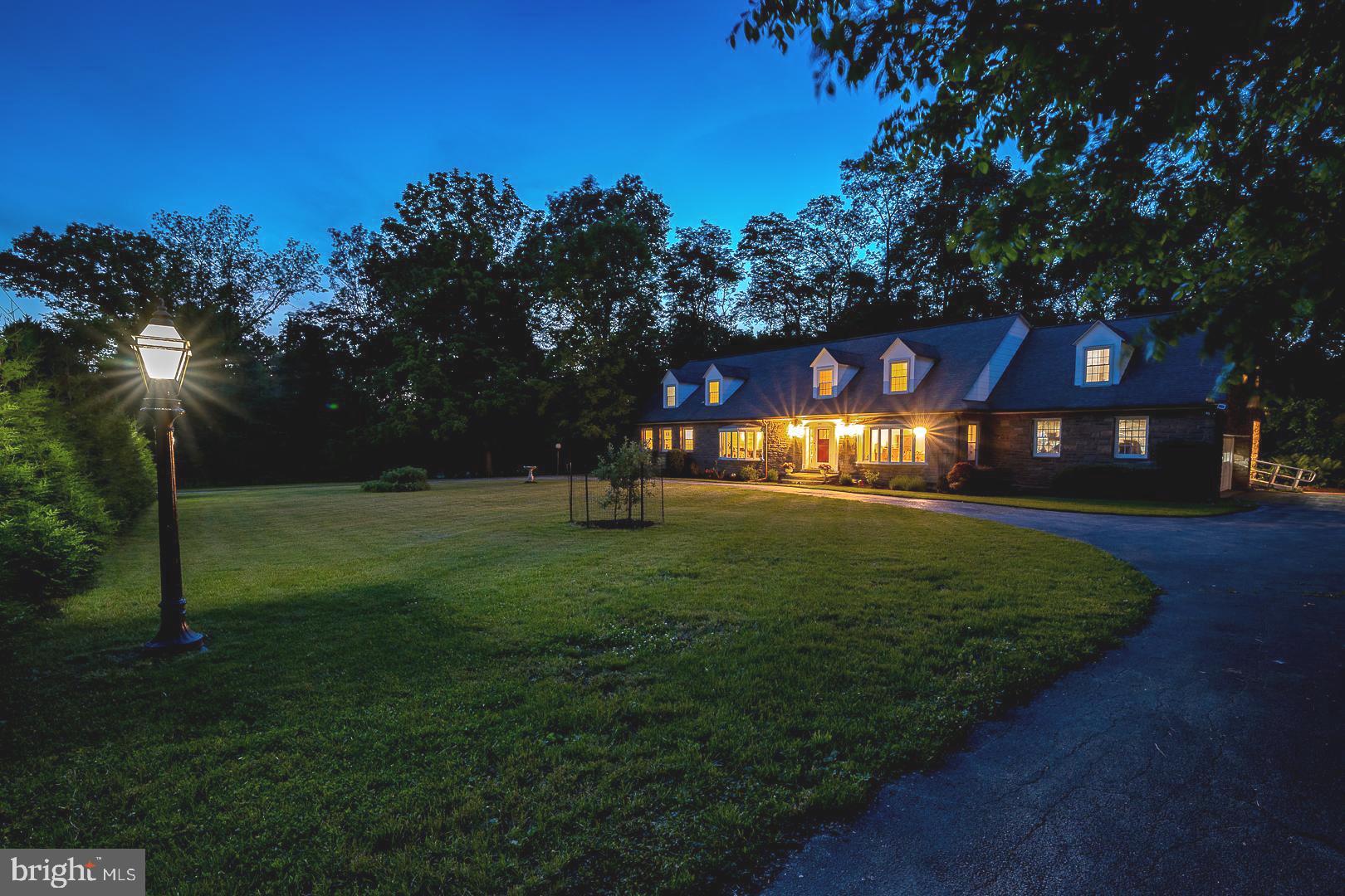 Uncover the essence of sophistication at 777 Germantown Pike where elegance meets functionality. This custom-built center-hall, stone colonial welcomes the third owner and their family into its sprawling 5,316 square feet of living space. Nestled on 1.43 acres, the property boasts a backyard trail, lush greenery and ample private and exterior entertaining space perfect for entertainers and families alike. As you approach the home you will be invited into the welcoming center-hall foyer through to the privacy of your backyard; the way this home interacts with its environment was part of its customization. Starting clockwise from the foyer will be the grand staircase and the library. The library, or formal sitting room features one of two oversized bay windows that overlook the front yard, and custom built-ins. As we continue through the library you will make your way into a potential first floor in-law suite area which features two large bedrooms and two full bathrooms, one of which is ADA accessible, complete with its own separate entrance to the exterior of the home. As we continue through the home you will find yourself in the large family room. This is the central gathering place of the home because of its size, the gorgeous stone fireplace and the two large sliding doors that open up to the private and peaceful backyard entertaining space. The kitchen features original, stainless steel, dual ovens, an induction cooktop and ample storage space- with the right updates, this kitchen could be the one of your dreams. Finishing out the first floor is the utility/laundry space, with access to the oversized two car garage, and the large formal dining room with the second oversized bay window. The second floor of 777 Germantown includes a peaceful sitting area overlooking the treetops of your backyard as you enter from the grand staircase. The east and west wing of this floor both feature four large bedrooms and two art-deco themed bathrooms. The basement is an additional 2,400sf and used to be a dance hall, which is ready for a personalized renovation. This home is perfect for any family or executive looking to settle themselves into the highly desirable Springfield Township School District. Located within close proximity to the Chestnut Hill Shopping District with shops, restaurants and two SETPA train stations that bring you to center city Philadelphia. This home sits across the street from the Wissahickon Park System with 52 miles of trails, this home has it all. With all of the infrastructure reworked throughout the entirety of this home it’s just a few cosmetic improvements away from being brought back to its original glory. See the listing agent for custom and available design concepts. This remarkable property is available for only the second time since its development and so don't miss the chance to make this your dream home!