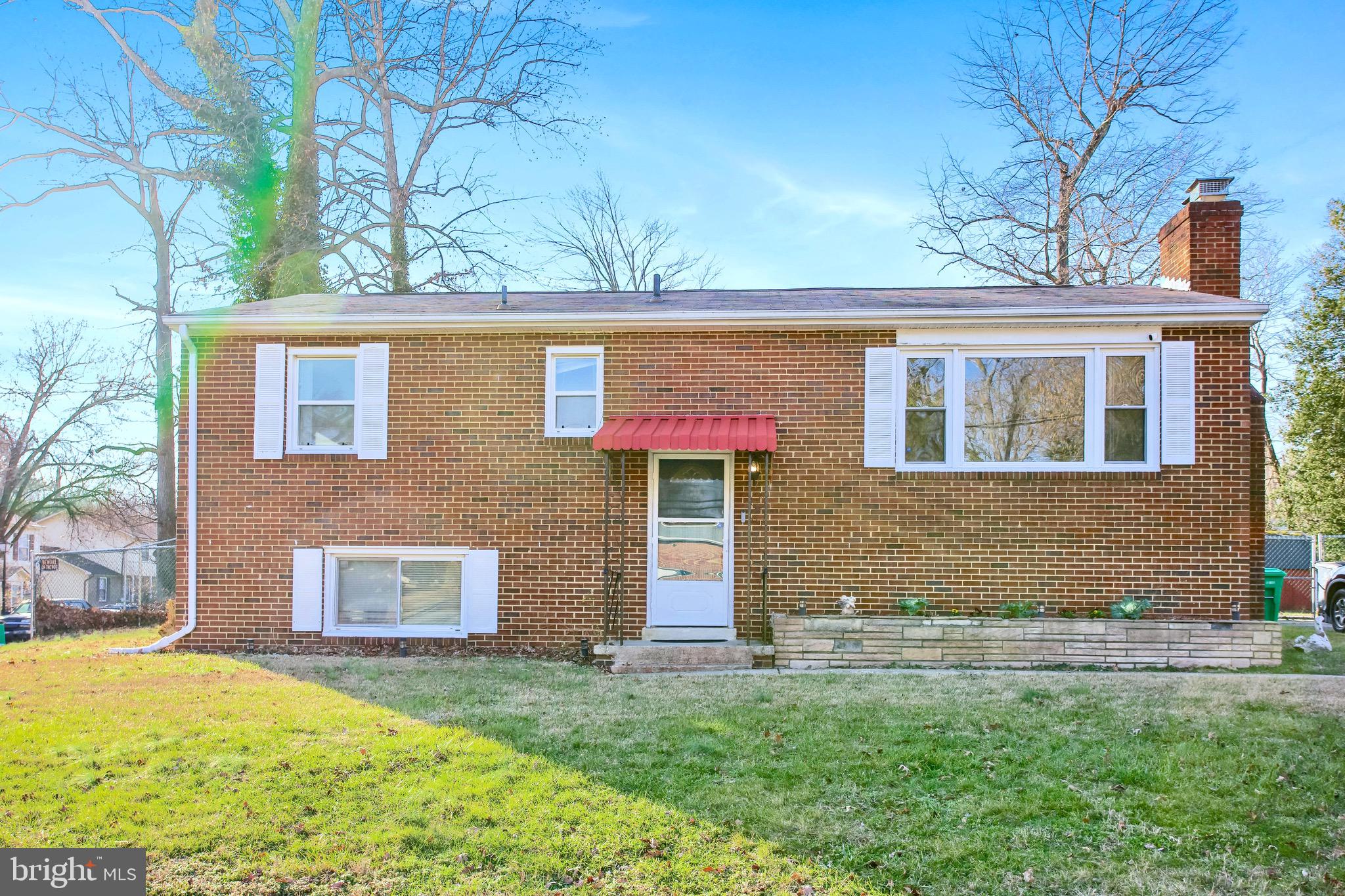 This super charming brick home offers three bedrooms + den,  a full + half bathroom and a large finished basement. 

As you enter into the home you will be greeted by a spacious living with a large picture window floods the main living area with light.  The main areas have new vinyl flooring which extends into the eat-in kitchen and down the hall to the three bedrooms and full bathroom.   This sunny home boasts a sizable finished basement which includes a large recreation or living space, a half bathroom, a den and a laundry/utility room. 
The covered, screened in porch is a great extension to the living space that can be utilized all year.  Going outside, the expansive yard is quite level and low maintenance- ready for hobbies, sports, pets, entertaining etc.  It is equipped with shed, perfect to keep your lawn equipment or extra storage. 

Come to the open house this weekend- Saturday and Sunday!