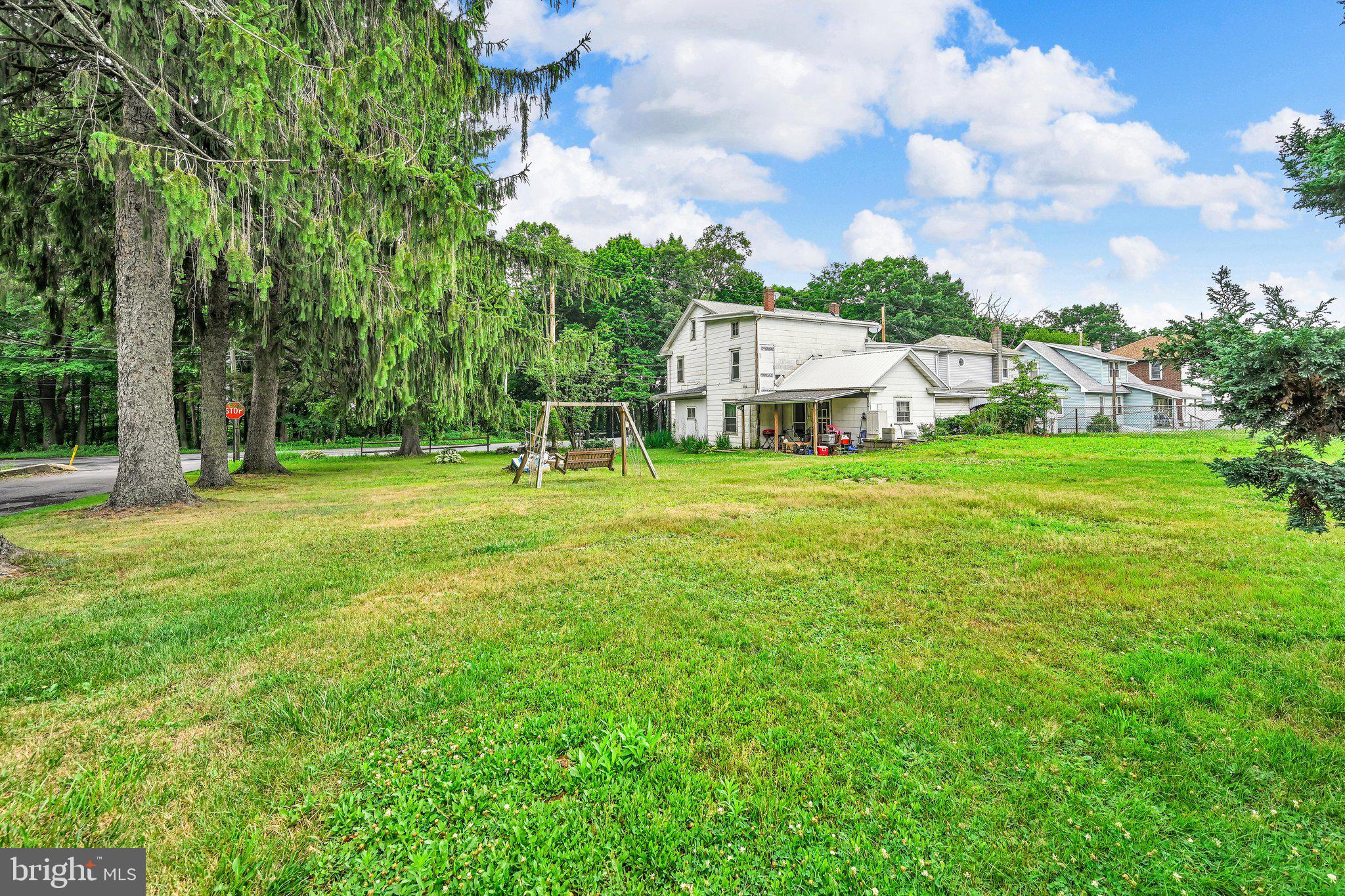 Enjoy the perfect blend of small town convenience and peaceful country living with this spacious home nestled on the edge of Tremont. Situated on a rare double lot totaling over a quarter acre, this property offers a beautiful rural setting with plenty of room to relax, entertain, or garden. Inside, you'll find exceptionally large living spaces, oversized bedrooms, and a spacious kitchen designed for comfortable everyday living. A full walk up attic provides abundant storage, while economical coal heat with classic cast iron radiators keeps utility costs low and the home warm all winter long. With ample off street parking and endless potential to make it your own, this affordable property is a fantastic opportunity to enjoy country charm without sacrificing convenience.