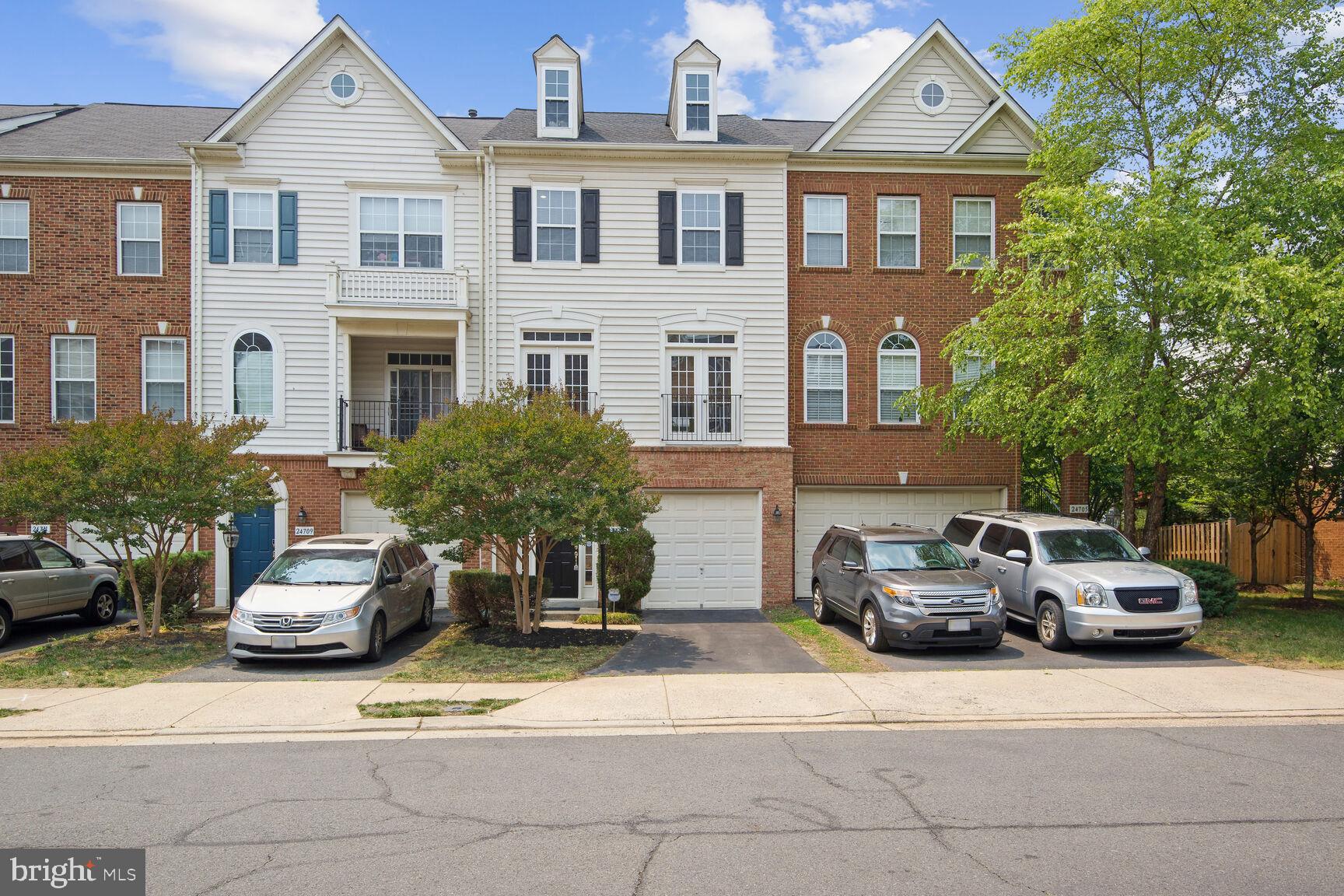 Immaculate 1 Car Garage Townhouse, Perfect Spacious with 2,150+ Sq Feet on 3 level 1 Car Garage Townhouse in Stone Ridge community - Most sought-after Amenities-Rich.  Home with  Bright Custom Neutral Paint with Upgraded LED lights with dimmer controls in all 3 Levels.  Renovated Kitchen and Bath cabinets , Upgraded with Some Stainless steel Appliances , Brand New Roofing installed. Walk into the Inviting Foyer. Main Upper Level1 has Wide open floor plan with spacious Upgraded Carpeted living room, Chefs Kitchen with upgraded appliances and Dining Area has gleaming hardwood Floors with Half Bath walks out to an Upgraded Deck Trex/wood Combination. , Upper Level 2  has Large Master Bed with full bath and Standing Shower, 2 more Bed Rooms with Access to One Full common bath on the upper level with Laundry located in the Upper Bed Room Level and Lower Level Large Recreation Room with half Bath with Granite Surround Fireplace, Walks Out to Large Fully Fenced Yard with Patio.  All Levels upgraded with Custom Carpeting and padding. Walking distance to Library, Shopping Mall, and Park and ride ( Bus service to DC ). Lot of visitor Parking behind the house. This home is located at walkable distance to Park and Ride to DC and  Minutes away from Metro Station, Gum Spring Library, Stone Springs Hospital, Physicians offices, Shopping and minutes from Route 50 and Route 606. This home is move in ready and located in a community loaded with amenities including an Multiple Outdoor Pools, MultipleTennis Courts,  club house, walking/jogging trails, exercise room, sports courts, playgrounds, tot lots Nearby Harris Teeter, Walmart, Target, Costco,  Dulles Landing Shopping Center, Dulles International Airport,  Silver Line Metro and so much more!. Photos taken before current tenant move in. Available for Move in 06/06/2025. Showings Available Now, Current Tenants move out process in progress.