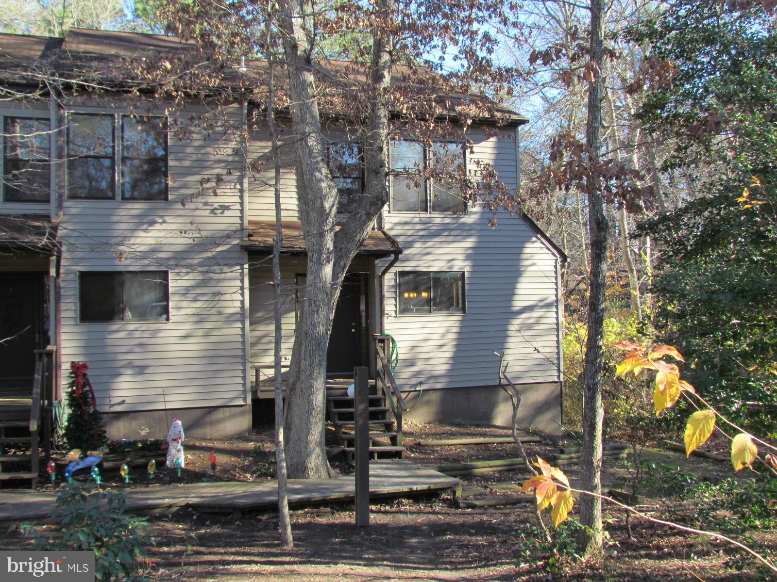 Spacious End-unit townhouse in quiet wooded setting. This 4 bedroom 3 1/2 bath home features 3 levels of living space. No smokers, pets are case-by-case