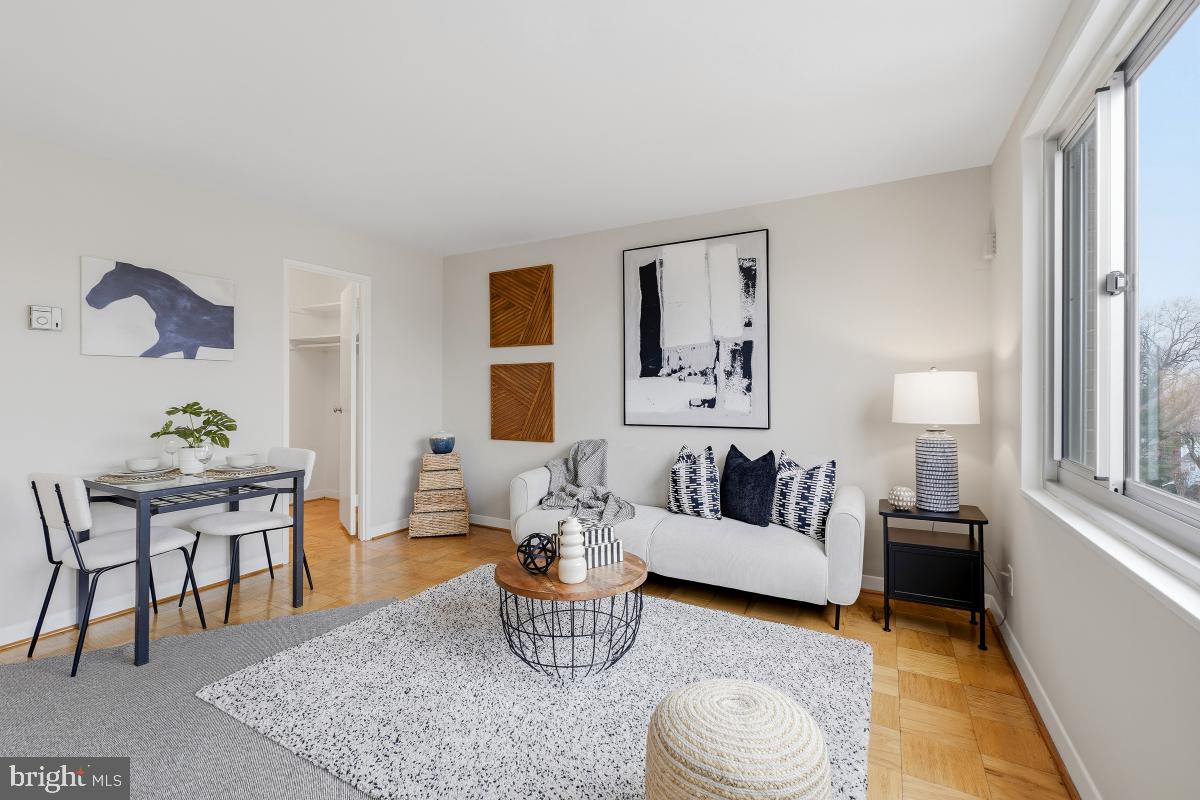 Floating high with sweeping panoramic views - this amazing and rarely available studio at Park Sutton has just been refreshed with good taste shining in all details. Beautiful and inspired in feel.  New white quartz countertop and white subway tile in the kitchen. New white bathroom - so pretty! Wall of huge windows and swathed in sunlight. Fee includes all utilities! Walk to Silver Spring Metro via tree lined streets.  Building has community feel with large lobby and comfy chairs, free parking, outdoor swimming pool with lifeguard and concierge. Situated near the future purple line and the future Capital Crescent bike path! Truly delightful!