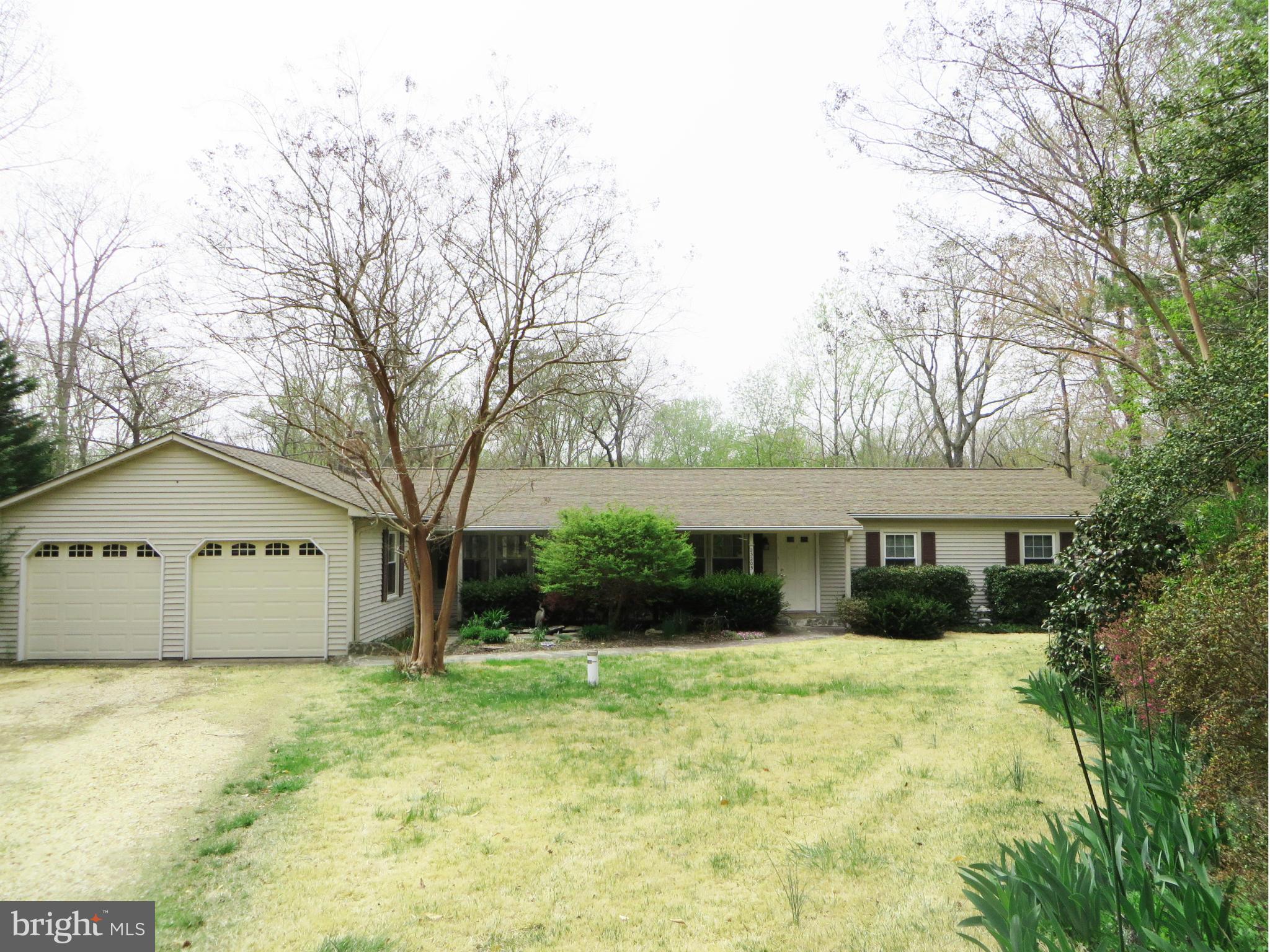 Many delights here! BIG rooms, hrdwd & ceramic tile, custom KT cabinets, sunroom, craft room, BIG deck, hot tub & in-ground POOL! Many improvements: replacement windows; well pump & pressure tank; fridge & dishwasher; garage doors; pool liner, heater, & filter; deck railings! FR w/wood stove insert, eat-in KT, LR w/sitting rm, DR, nice MBR. 2-car gar, floored attic, landscaping, workshop!