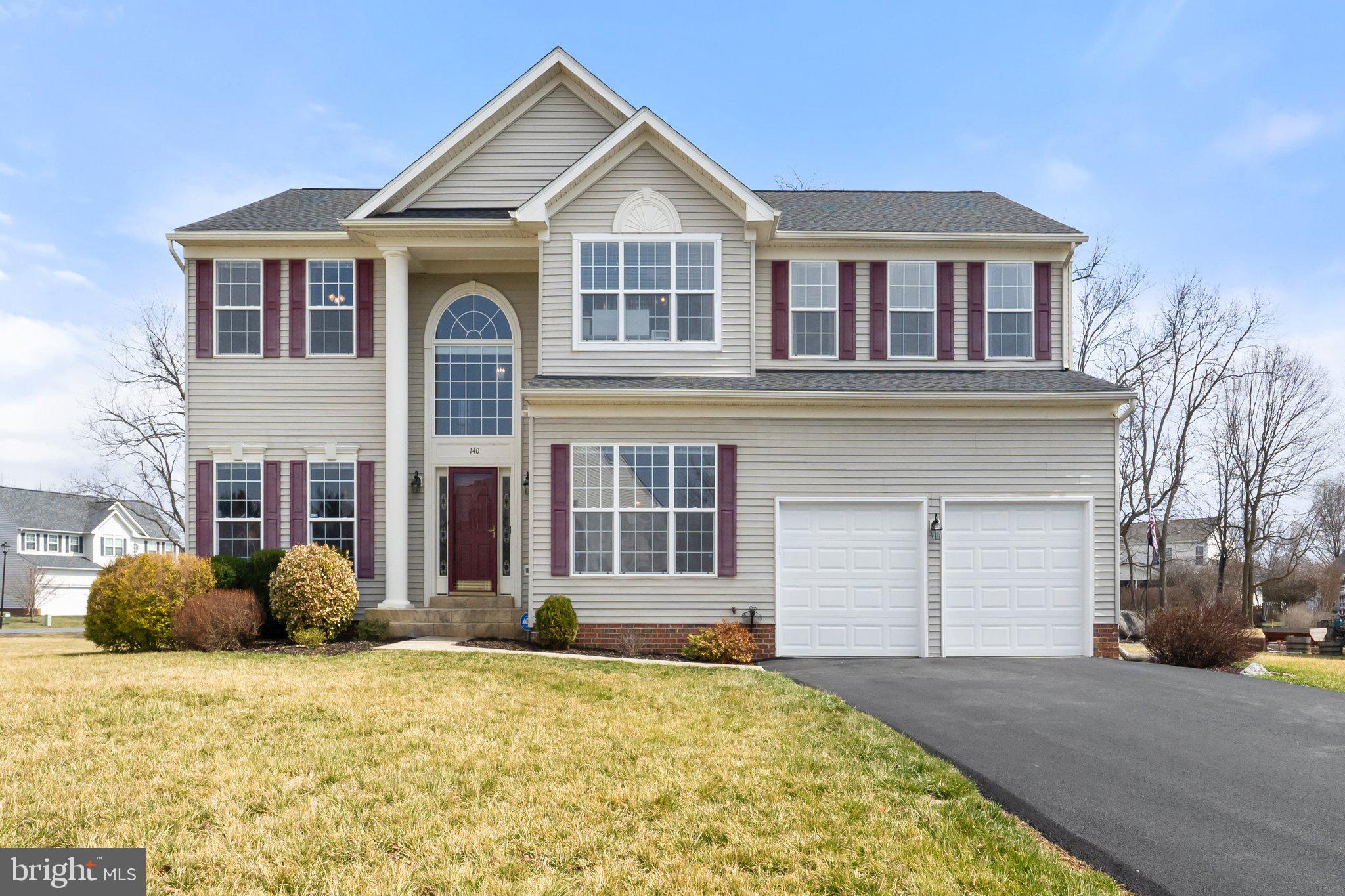 Enter into the two-story foyer, where natural light floods through, creating a warm and inviting atmosphere. This beautifully maintained home in the sought-after Locust Hill community offers a blend of modern upgrades and timeless charm, as well as a community golf course to enjoy. With nine-foot ceilings, a gourmet kitchen, and an extended family room, this home provides both comfort and functionality.

The spacious primary suite features a vaulted ceiling, brand-new carpet installed in 2024, and an adjoining sitting room with new carpet as well. Ceiling fans have been added to the primary suite, sitting room, all three bedrooms, and the family room for year-round comfort. Upstairs, there are three generously sized bedrooms, two of which have walk-in closets. The hall bath has a large closet with a tub-shower combination that completes the upper level.

The gourmet kitchen has been updated with a new backsplash, countertops, and sink, creating a fresh and stylish space for cooking and entertaining.  The stainless-steel refrigerator has plenty of storage space. The gas line in the kitchen has been capped off but can easily be converted back for gas cooking. The open layout flows seamlessly into the family room, which is anchored by a cozy gas fireplace. The dining room is enhanced by shadowboxing that beautifully complements the crown molding.

The basement has been improved with additional electrical outlets, cable, ductwork vents, and carpeting and offers roughly 1400 additional sqft.  As an added bonus the fridge and standup freezer in the basement convey.   The home also features a water softener and a radon mitigation system, as well as a rough-in for a bathroom.  A multi-level wood deck with composite tile flooring includes a 220V/50-amp electrical box, new stairs, and structural upgrades. The driveway was repaved in 2023, and the garage doors and trim were replaced in 2021, for your convenience there are two garage door openers with remotes. The roof was updated in 2018, and the home features a hybrid HVAC system in the basement and a heat pump upstairs, installed in 2013. Colonial trim details throughout add to the home’s classic appeal.

Outside, the home features a level backyard that backs to trees, providing extra privacy when in bloom.

This home offers a fantastic combination of space, modern upgrades, and thoughtful improvements, all security cameras and alarm system convey.
