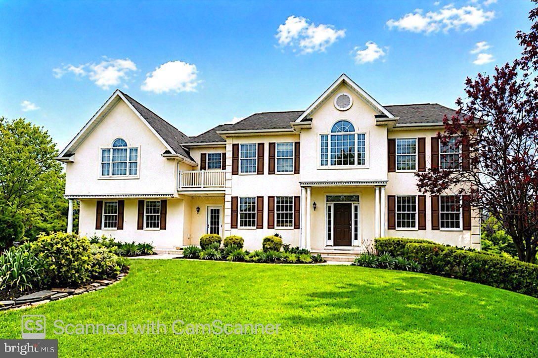 Custom-built residence located in the desirable West Wynd community of Northampton Township, within the award-winning Council Rock School District. Set on approximately 1.8 acres, the property offers a combination of open yard space and mature wooded surroundings, including a footbridge leading to an additional park-like area.
The main level features a two-story foyer, formal living and dining rooms, a private office, powder room, and a family room with a vaulted ceiling and an expansive wall of windows overlooking the rear grounds. The kitchen provides ample cabinetry and workspace and opens to a bright breakfast area. A generously sized laundry room with convenient access to the exterior completes the first floor.
The upper level includes a primary bedroom suite with a full bath and walk-in closets, along with a versatile loft area suitable for a variety of uses. Three additional bedrooms and a full hall bath complete this level.
The walk-out lower level is largely finished and offers a recreation area, two additional rooms, a full bath, workshop, and storage space.
Additional features include a three-car garage, with one bay currently configured for storage or shed use.