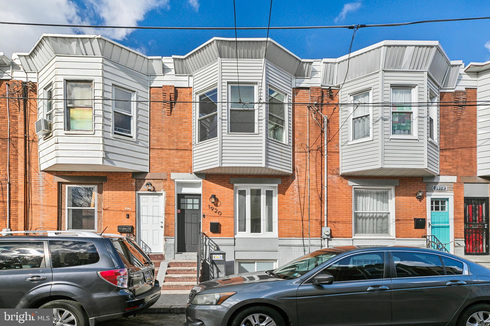Welcome to 1920 S Woodstock Street, a beautifully renovated 3-bed, 1.5-bath home in Point Breeze featuring a bright open floor plan and modern finishes throughout.

The spacious first floor, complete with half bath, boasts hardwood floors, recessed lighting, and a seamless flow between the living, dining, and kitchen areas.  This home is equipped with smart features, including an electronic front door keypad, Google Nest doorbell, Google Nest thermostat, and Lutron Smart Light system with a hub—allowing you to control the lights via an app or voice commands. 

The chef’s kitchen is equipped with quartz countertops, white shaker cabinets, a stylish chevron backsplash, and stainless steel appliances, including a French door refrigerator, six-burner gas range with overhead vent hood, dishwasher, and a deep steel basin sink with a black gooseneck faucet. An elevated breakfast bar and dining area sit beside sliding glass doors leading to a large backyard—perfect for entertaining. The finished basement offers extra living space, a side-by-side washer and dryer, and ample storage.

Upstairs, the primary bedroom is bright and airy with oversized bay windows and deep built-in shelving between two closets. The rear bedroom enjoys abundant natural light from windows on two sides and features a closet with sliding doors. The center bedroom is ideal for a home office or guest space. The full bathroom includes a floating vanity with storage, an LED-backlit mirror, and a shower/tub combo with a built-in niche shelf for convenience. 

Conveniently located near Geno’s & Pat’s Steaks, the Italian Market, Passyunk Square, and major highways, this home provides easy access to Center City, the airport, and top Philly attractions.

Don’t wait—schedule your showing today!