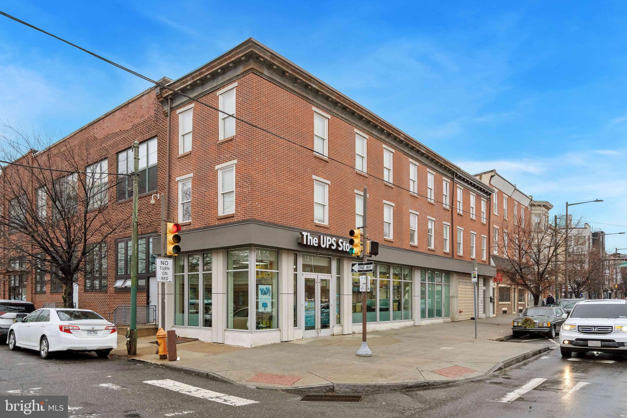 1201 N 3rd Street: We are pleased to present 3rd and Girard, home to The UPS Store and two residential units. This highly-visible corner is a signalized intersection and offers tremendous exposure to the ground floor retail tenant and abundant light to the units above. The mixed-use triplex features 78’ frontage along Girard Avenue and 18’ on 3rd Street. Girard Avenue is one of the main commercial corridors in Northern Liberties and counts 15,000 vehicles per day. The building had a full gut rehab in 2017 and received a ten year tax abatement that expires at the end of 2028. The UPS Store leases 1,000 SF on the ground floor plus 900 SF of basement space. This is a franchisee signed lease and is in Year 7 of their 10-year base term with (2) five-year renewal options. UPS is responsible for 52% of insurance and taxes, as well as 52% of the other usual triple-net charges (utilities, snow removal, maintenance, water/sewer, trash tax, etc.). The storefront features floor-to-ceiling glass windows with high-energy efficiency glass, with a very low solar heat gain co-efficiency rating. On the upper floors are (2) two-bedroom/one-bath units with an open kitchen and living space. Each unit has its own washer and dryer, stainless steel appliances, granite countertops, white subway tile backsplash and double vanities in the bathroom. This building offers an excellent opportunity to own a stabilized asset in a growing neighborhood.