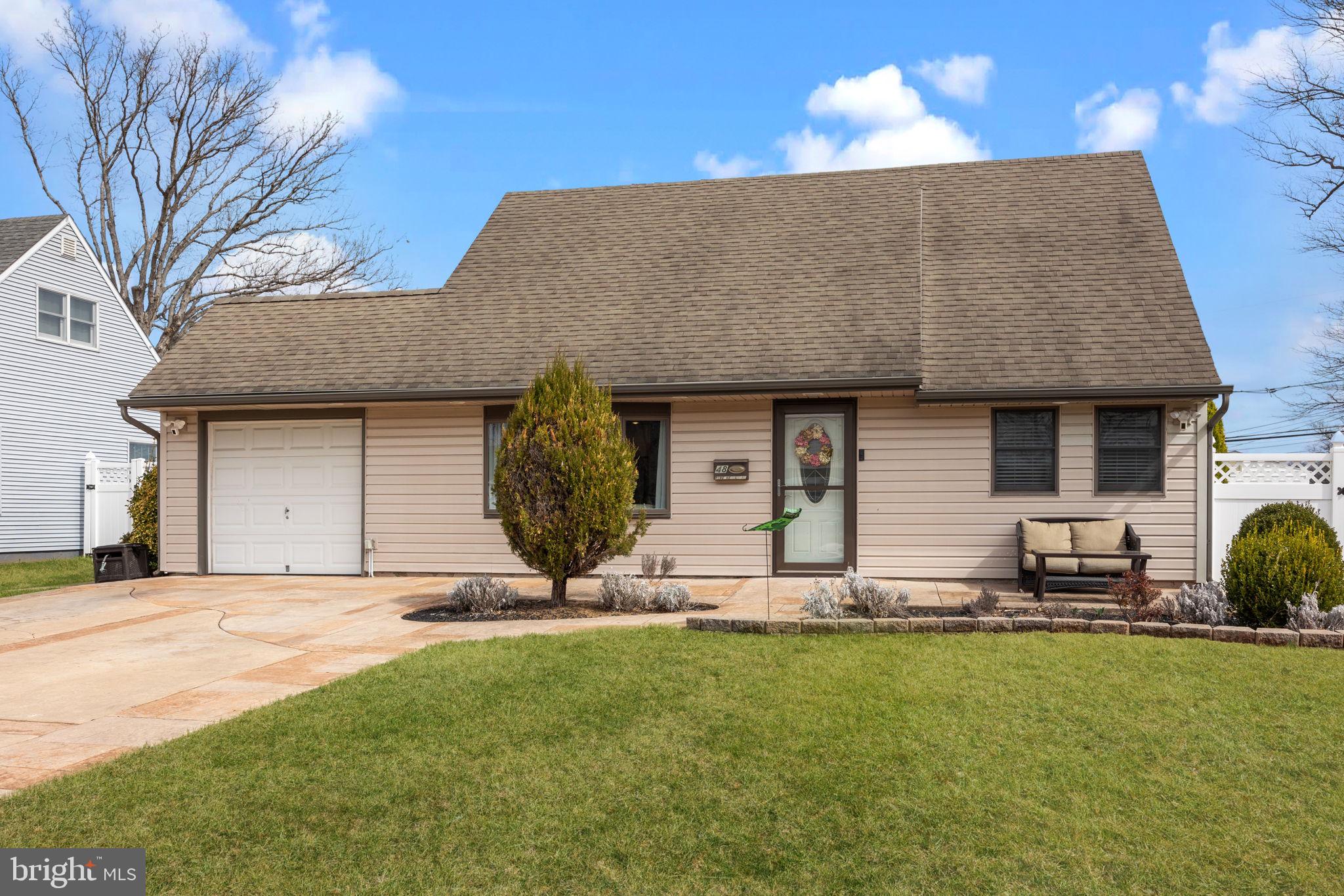 Discover this beautifully upgraded 3-bedroom, 2-bathroom Expanded Jubilee in Levittown's sought-after Plumridge neighborhood.
The interior boasts an open floor plan, beautiful luxury vinyl flooring (with radiant heat in the living room and hallway)  and recessed lighting throughout.   There is a pellet-stove fireplace and a stunning white kitchen with stainless steel appliances and a large island.  The main floor also has a generous primary bedroom with a oversized walk in closet.  Rounding out the main floor is a full bath, laundry room and plenty of storage.  Upstairs offers 2 more bedrooms and another full bath.
The exterior has low-maintenance vinyl siding, a stamped concrete 4-car driveway that wraps around to form an enormous front and back patio- perfect for outdoor entertaining. The backyard has a large fenced in yard with above ground pool, and a sun drenched sun room equipped with screened in sliding glass doors. This home is perfect inside and out!