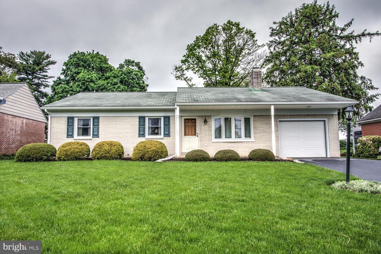 Beautifully Maintained home in Millersville Boro. This very clean one-story home has 3 bedrooms and 1 and 1/2 baths. There is a large living room with a wood burning fireplace adjoining a nice formal dining room. The Kitchen is comfortable sized with plenty of cabinets and counter space.  There is a bright heated four seasons room with great windows for lots of sunlight. The 3 bedrooms lend themselves to spacious living with one having its own half bath. 
Downstairs is an immaculate basement with the gas furnace and gas hot water heater. There is a large one car garage with an epoxy floor and pulldown stairs to the attic. Don't miss this quaint Millersville home. Valance in Living room does not stay.