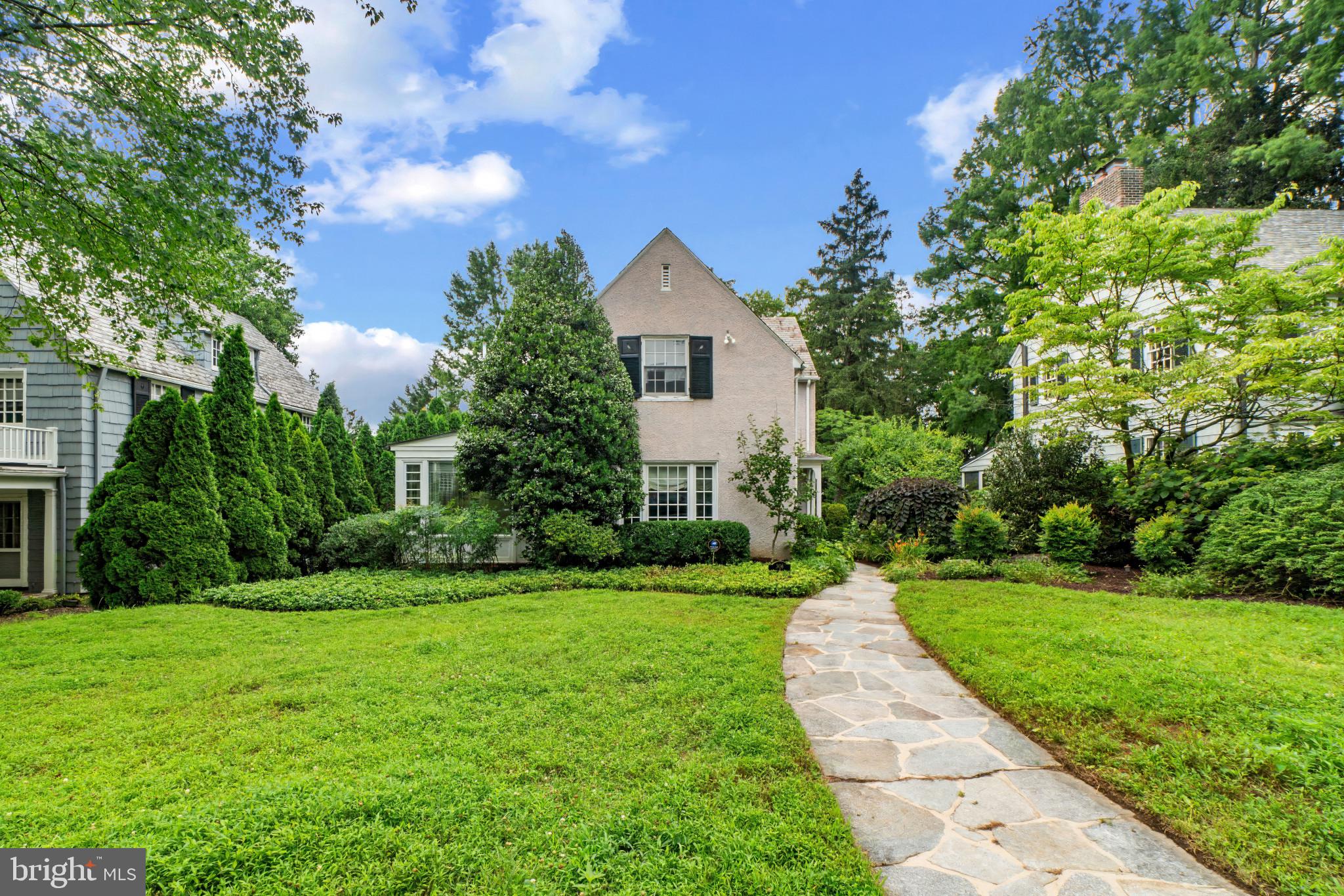 Fall in love with this enchanting home, ideally located just blocks from the picturesque Lakes of Homeland, where winding paths, koi ponds, and resident ducks create a truly special neighborhood setting. A spacious, welcoming foyer sets the tone for the light-filled interior. The generous living room is perfect for hosting gatherings or enjoying cozy evenings by the fireplace, while the sunroom, surrounded by windows on three sides, is bathed in natural light throughout the day.
Designed for both everyday living and entertaining, the formal dining room opens to a covered porch overlooking the backyard—an ideal space for relaxing or dining outdoors. The thoughtfully designed kitchen features abundant cabinetry, stainless steel appliances, and breakfast bar with half bath on first level.
Upstairs, you'll find three comfortable bedrooms and two full baths, including an updated primary suite with a beautifully renovated bath featuring a spacious walk-in shower. Two additional generously sized bedrooms complete the upper level.
The semi-finished basement offers endless possibilities to create the space you've always envisioned—whether it's a recreation room, home gym, workshop, or additional living area.
Outside, mature landscaping and thoughtfully designed garden beds provide year-round beauty and curb appeal. A detached garage at the rear of the property offers the convenience of off-street parking, completing this charming Homeland home.