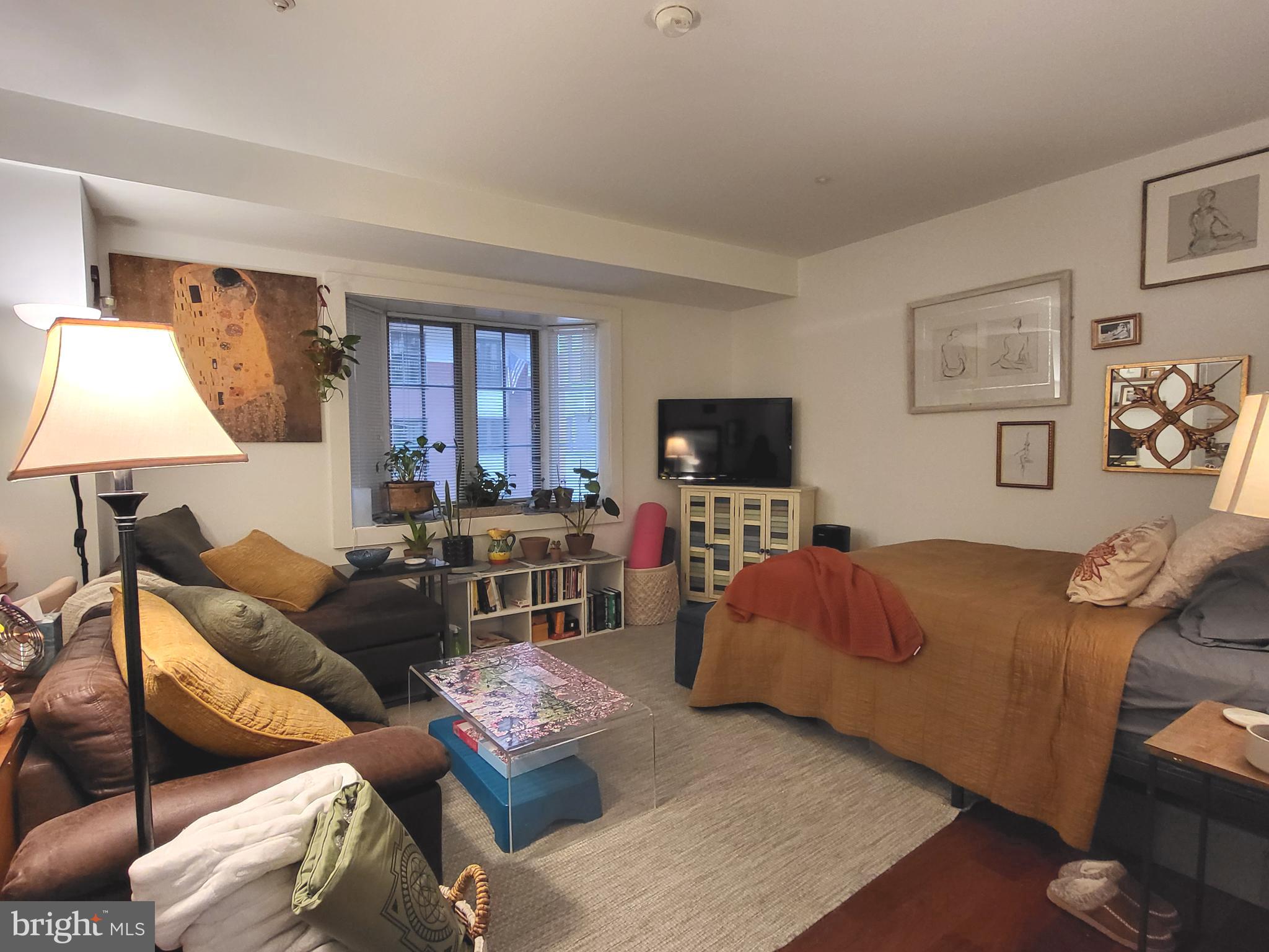 Spacious studio with courtyard views in the highly coveted Parc Rittenhouse right on Rittenhouse Square! This perfectly sized home features an efficient layout and Brazilian cherry hardwood floors throughout. The open living area enjoys a bay window overlooking the building's landscaped courtyard and a wall closet. Adjacent is the open eat-in kitchen with ample flat panel cabinetry, granite countertops, stainless steel appliances, and a large pantry/storage closet. The marble-appointed bathroom features a large white vanity, tub shower with white tiling, and tile floor. There is a washer/dryer in the kitchen and baseboard molding throughout. Residents of Parc Rittenhouse enjoy world class amenities and services including a 24 hour doorman; an amenities suite with a state-of-the-art fitness center and resident lounge with pantry; media room; outdoor rooftop pool club with a large pool deck, full size pool, kids pool and hot tub. There is garage parking below the building for an additional fee; and two amazing restaurants on the ground floor, Stephen Starr’s Parc and Via Locusta.