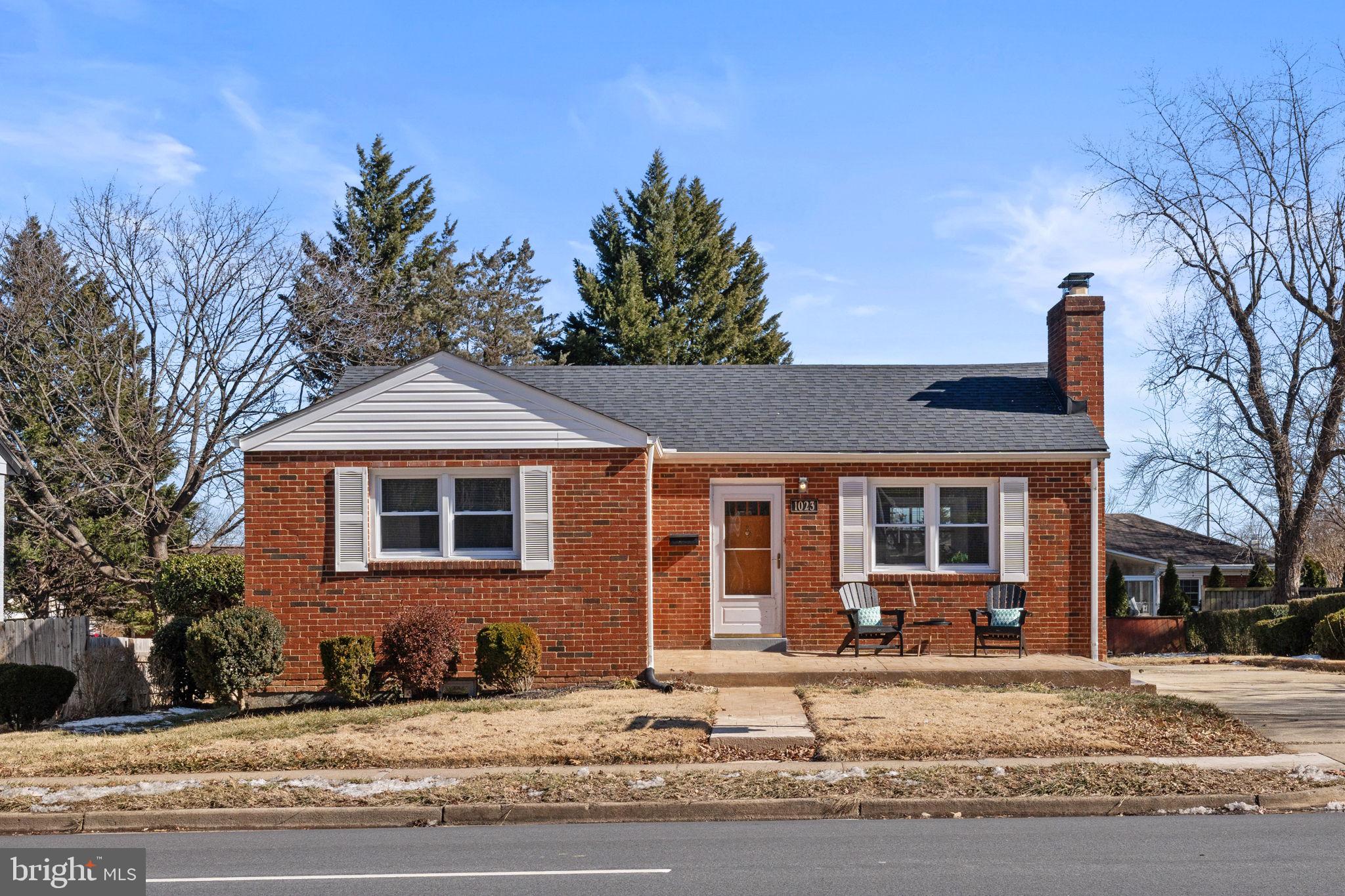 Fabulous all brick rambler on an oversized lot. Welcomed by a large new custom concrete front patio, the living room has a large picture window and wood burning fireplace with brick surround. There is a  formal dining room, hall pantry closet and spacious kitchen with cherry cabinets, glass tile backsplash and ceramic tile floor. Rear access to yard is convenient for out door entertaining and yard games. Three bedrooms on main level with an updated full bath.  The lower level has an open recreation area with egress to the rear yard. Three additional bonus room are perfect for home office , crafts room or overnight guest. Updated full bath with shower, laundry room and storage. Off street parking and ample exterior storage! This home has had numerous updates over the last 2 years to include: roof (2023), replacement windows (2024), main sewer line replaced, kitchen cabinets, counters and tile. Interior recently painted, finished lower level with newer carpet.  Beautiful wood floors through out the main level.  rear yard is level and welcomes expansion or creating your dream oasis!  Two exterior structures are perfect for lawn equipment, tools or bicycles and toys!  Convenient to shops and restaurants in Bradlee Center, Ramparts, Shops at Shirlington, Reagan Airport, The Pentagon, Crystal City and DC!