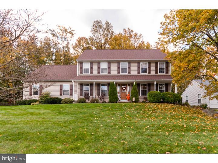 Beautifully maintained and upgraded colonial home nestled on a premium level lot backing to woods at the top of The Woods at Naamans in the Blue Ribbon Garnet Valley School District.  Some of the many wonderful features of this home include a spacious formal living room with cozy electric fireplace, beautiful formal dining room and upgraded gourmet kitchen with center island, granite counters, tile back splash, pendant lighting, and lots of cabinets, spacious first floor laundry/mud room, a cozy family room with hardwood floors and glass sliders leading out to a sun room with a hot tub, as well as a deck that is perfect for enjoying the large private wooded backyard.  The upper level is elegantly appointed with a large master suite complete with an over sized walk in closet and several additional closets for plenty of storage, luxurious en suite bath with vaulted ceilings and skylights, and a separate sitting area large enough to be used as a private office.  Three additional spacious bedrooms and a hall bath complete the second floor. The elegantly finished basement adds additional living space with beautiful hardwoods and built in custom cabinetry, and also features an unfinished area for additional storage.  The large, fenced in backyard is the largest in the community and backs up to mature trees.  This home, one of the largest in the neighborhood, and is a must see.