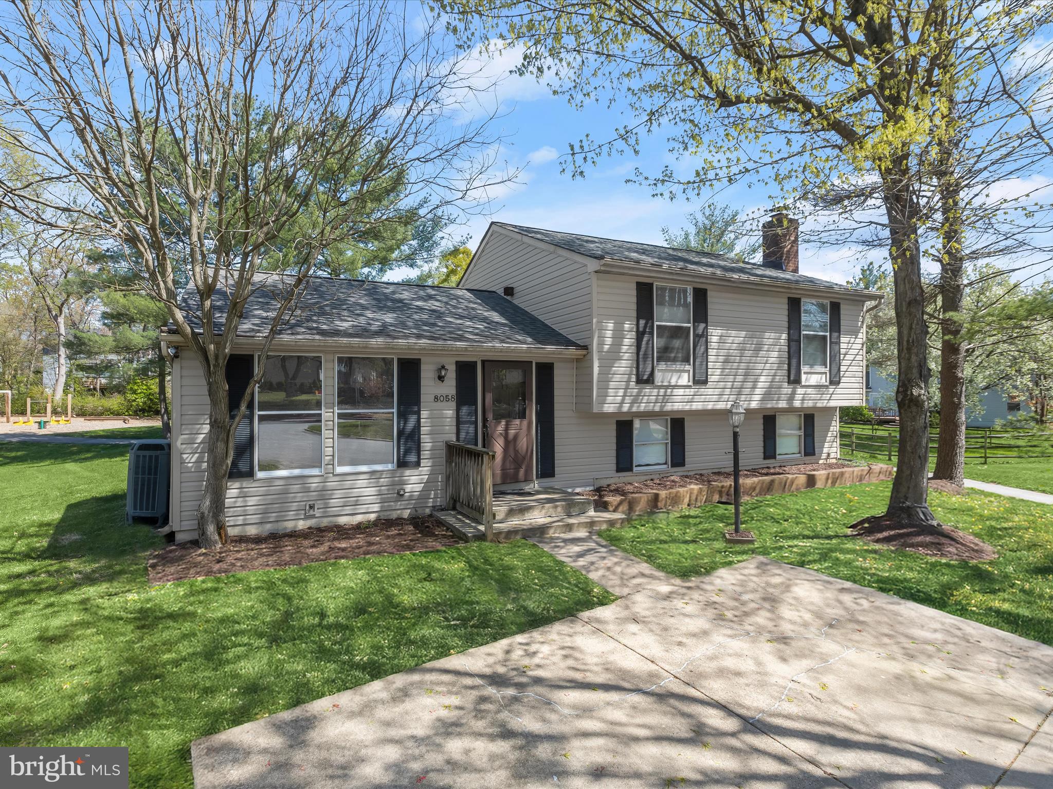 Tucked away on a quiet cul-de-sac, this four-level split home offers generous space and exceptional potential in a prime location. Step inside to find a living and dining combination with vaulted ceilings that add a sense of openness. The dining area flows seamlessly into the kitchen and features a sliding glass door that leads out to the deck, perfect for outdoor dining or morning coffee overlooking the community playground and mature trees just beyond the backyard.
Upstairs, the spacious primary bedroom offers a retreat complete with an en-suite bath. Two additional bedrooms and a full hall bath complete the upper level, offering comfort and convenience for family or guests. Downstairs, the first lower level welcomes you with a family room, where a fireplace insert with a classic brick surround serves as a focal point.
Continue down to the second lower level and discover a recreation room and a flexible space that can serve as a fourth bedroom, home office, exercise room, or hobby room. This room connects to the laundry area, adding functionality to its potential.
With a layout ready to be tailored to your vision, this home, being sold as-is, presents an exciting opportunity in a well-connected location. Situated on Andiron Lane, it offers quick access to I-95, Route 1, and MD-32, simplifying daily commutes to Baltimore, Washington D.C., and Fort Meade. Situated nearby are endless shopping and dining options, and BWI Airport is close by for easy travel.