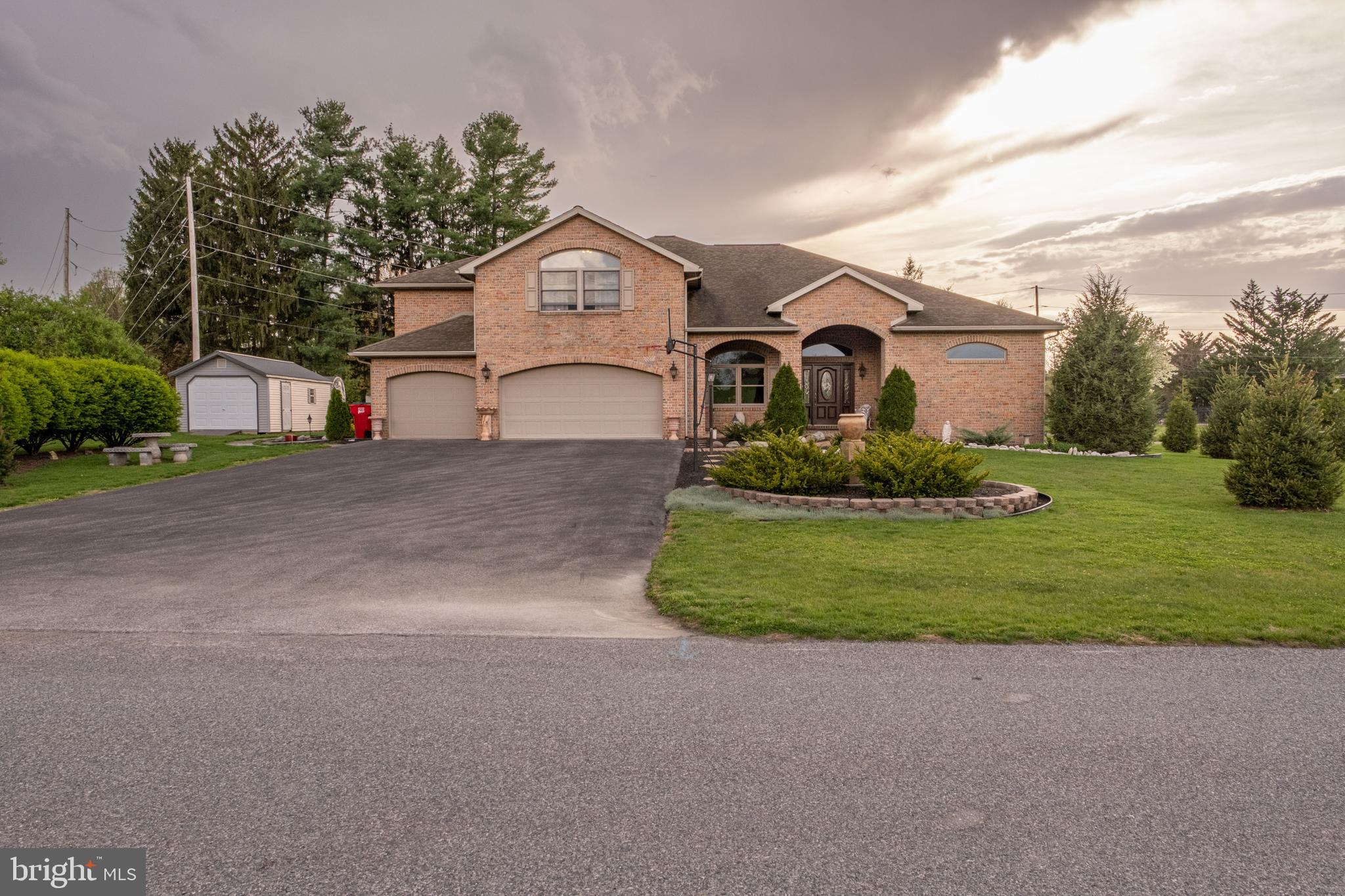 Welcome to 536 Remington Drive, where timeless comfort meets bright, Florida-style living in the heart of Shippensburg. This beautifully maintained brick home features soaring ten-foot ceilings throughout, creating an open, airy feel that immediately invites you in.

The thoughtfully updated kitchen, completed in 2023, blends modern convenience with classic charm, while a mix of wood, ceramic tile, and luxury vinyl plank flooring adds both durability and style—especially with tile extending through high-traffic areas.

Step into the sunroom and feel the day slow down—bathed in natural light, it’s the perfect place for morning coffee, quiet reading, or simply watching the seasons change. Just beyond, a relaxing porch and a patio with a retractable awning offer ideal spaces for entertaining or unwinding in comfort.

The oversized backyard provides endless potential, whether you envision a future pool, expanded landscaping, or a private outdoor retreat. Fresh new landscaping.

Inside, you’ll find thoughtful upgrades throughout, including new shelving in bedroom closets, new flooring in the upstairs bedroom, and a versatile basement workshop perfect for hobbies, storage, or creative projects.

Nestled in a desirable, well-kept neighborhood, this home offers both tranquility and convenience—just minutes from local grocery stores and only a short 10-minute drive to Chambersburg.

This is more than a home—it’s a lifestyle of comfort, space, and quiet elegance.