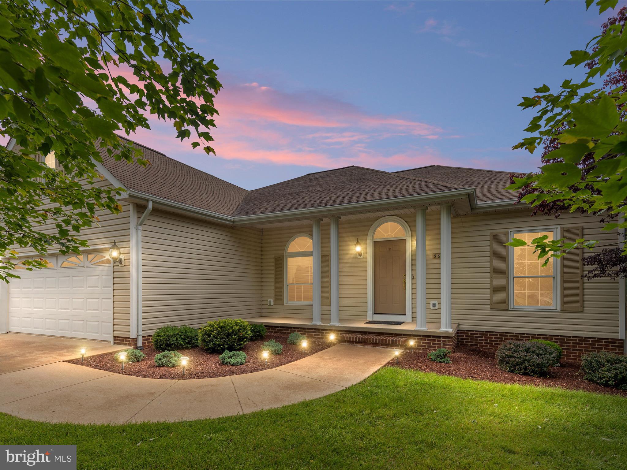 This charming 3-bedroom, 2-bath single-level home offers over 2,000 sq. feet of beautifully finished main level living space, plus an additional 2,000 sq. feet of unfinished basement space just waiting for your custom touch.  Inside, enjoy soaring 9-foot ceilings, a bright open floor plan, and gorgeous hardwood floors throughout the main living areas, with cozy carpeting in the bedrooms.  The thoughtfully designed split-bedroom layout offers privacy and flexibility for any lifestyle.  The heart of the home is the stylish kitchen, complete with sleek stainless-steel appliances, a large island centerpiece, and abundant cabinetry.  Relax by the gas fireplace in the living room, or step outside to your screened-in, covered rear porch to savor the peaceful mountain views and beautifully landscaped, level backyard.  Located in a sought after, established neighborhood with a true sense of community, this home is the perfect blend of modern comfort, traditional charm, and incredible potential for future expansion.  Homes like this don't last—schedule your showing today!