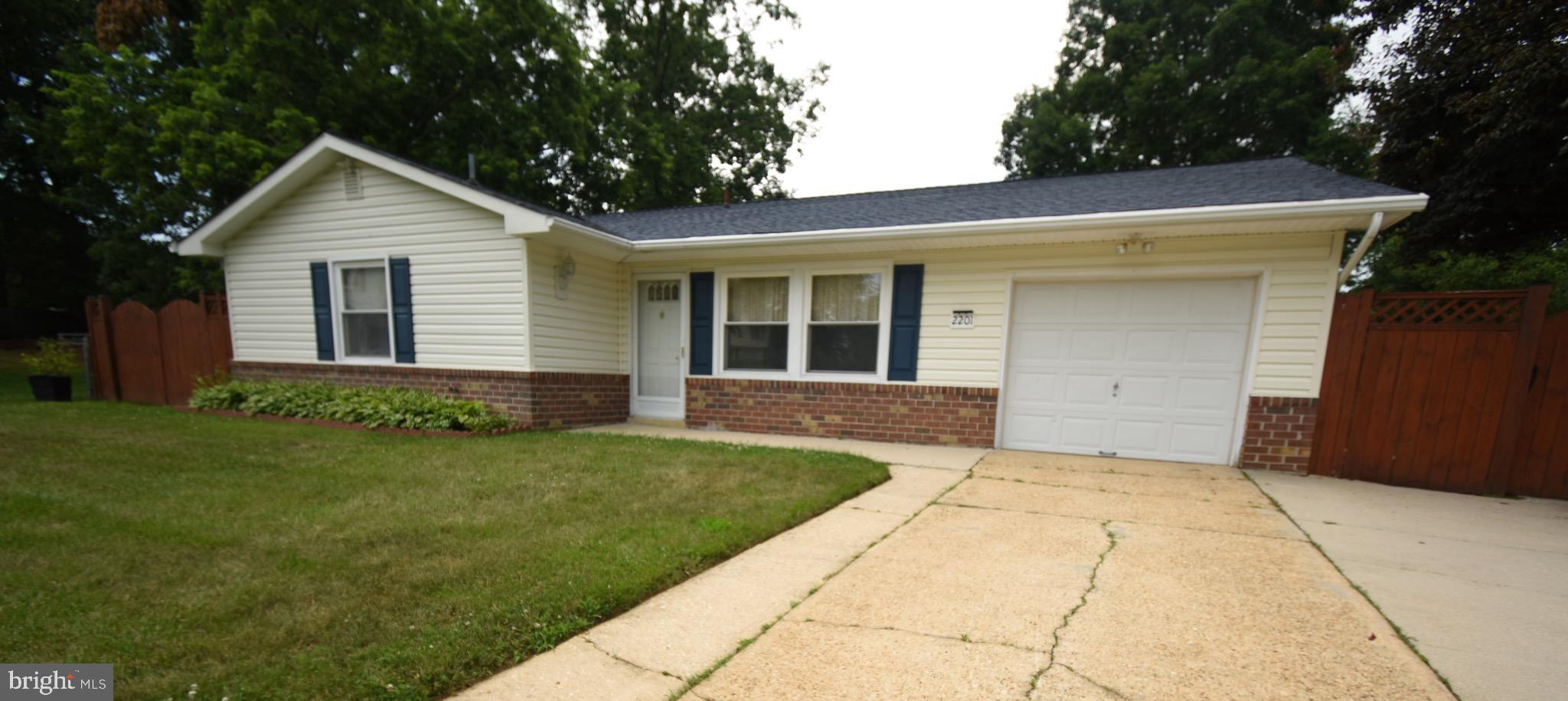 FRESHLY PAINTED - ALL NEW FLOORING - VINYL PLANK AND CARPET - ROOF - SIDING REPLACED - HUGE LIVING ROOM/FAMILY ROOM - FORMAL SEPARATE DINING ROOM WITH FRENCH DOOR LEADING TO REAR PATIO - WONDERFUL HOME FOR EVERYDAY LIFE OR ENTERTAINING - ENORMOUS REAR YARD - GREAT FOR YEAR- ROUND FUN - FULLY FENCED YARD 
MAIN BEDROOM WITH FULL BATH - DOUBLE CLOSETS - TWO ADDITIONAL BEDROOMS - GREAT SIZED ROOMS - EAT-IN KITCHEN - SEPARATE LAUNDRY ROOM WITH SIDE DOOR AND ACCESS TO GARAGE - BRAND NEW LAUNDRY TUB - GREAT FOR EXTRA STORAGE - SHELVING IN LAUNDRY CONVEYS - MICROWAVE AND CART TO CONVEY, FREE STANDING PANTRY CABINET TO CONVEY - ONE YEAR HOME WARRANTY