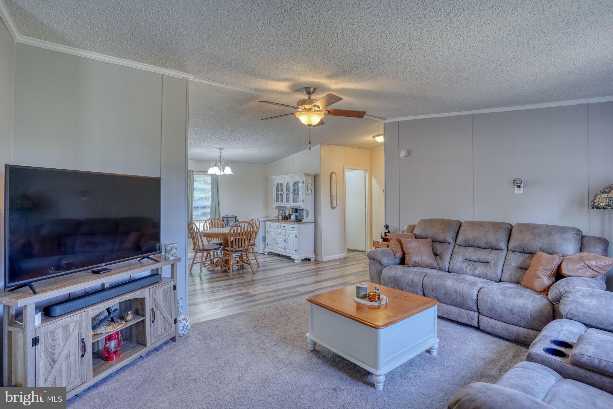 Welcome home to this beautifully maintained 3-bedroom, 2 full bathroom home situated on just under two-acre lot! Featuring an open concept layout, this move-in ready property offers the perfect blend of comfort and functionality. Enjoy seamless flow between the living, dining, and kitchen areas — ideal for both everyday living and entertaining. With plenty of outdoor space to relax, garden, or create your dream backyard oasis, this property gives you the best of peaceful living while still being conveniently located.