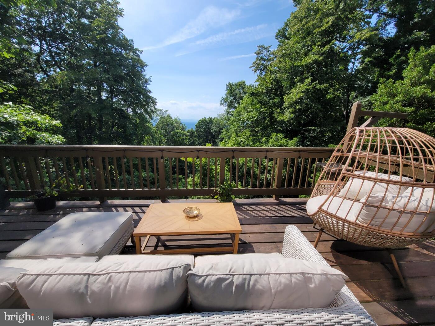 Turnkey Mountain Cabin | Getaway Home or Income Property | Selling Fully Furnished with Adjacent Half-Acre Lot

Rare opportunity — fully permitted cabin near Shenandoah National Park with an active Conditional Use Permit and proven Top 10% Airbnb track record. Use as a personal getaway home, active STR, or both — sells completely furnished. Features west-facing sunset views, large outdoor deck, private hot tub, heated bathroom floors, wood stove, game field for cornhole, high-speed internet, cell phone reception, and paved driveway. Windows, siding, and HVAC installed in 2023. Unfinished basement for additional storage. Sale includes neighboring half-acre lot (Lot 23C 2 2 78) — buildable or natural buffer.