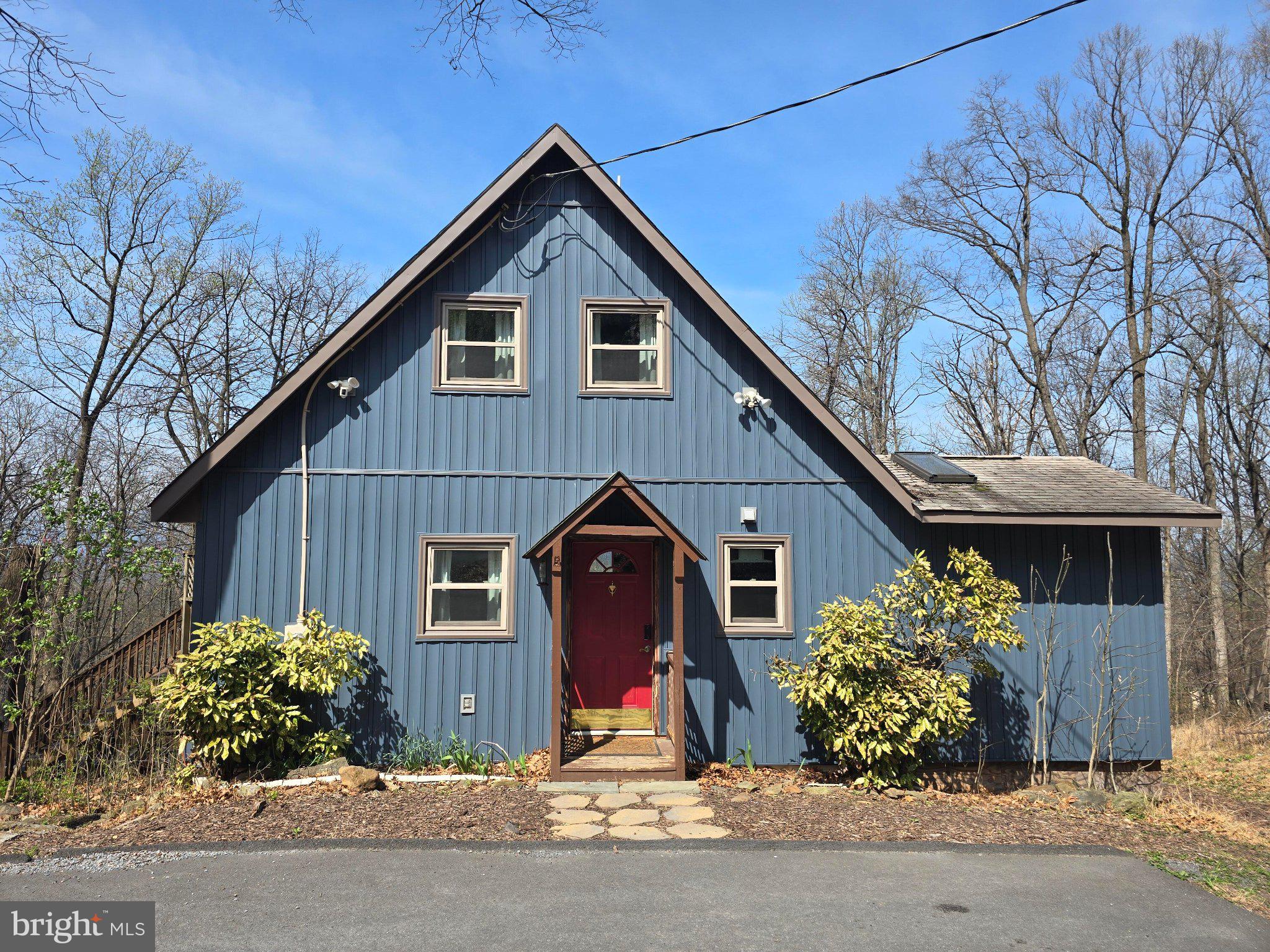 Turnkey Mountain Cabin | Getaway Home or Income Property | Selling Fully Furnished with Adjacent Half-Acre Lot

Rare opportunity — fully permitted cabin near Shenandoah National Park with an active Conditional Use Permit and proven Top 5% Airbnb track record. Use as a personal getaway home, active STR, or both — sells completely furnished. Features west-facing sunset views, large outdoor deck, private hot tub, heated bathroom floors, wood stove, game field for cornhole, high-speed internet, cell phone reception, and paved driveway. Windows, siding, and HVAC installed in 2023. Unfinished basement for additional storage. Sale includes neighboring half-acre lot (Lot 23C 2 2 78) — buildable or natural buffer.