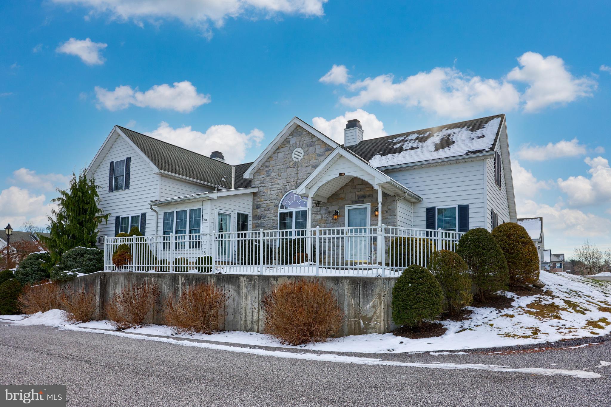 The Villas on the Lake is a highly sought after community in that it offers great open floor plans for one floor living and its ultra convenient location just off of I83 at Exit 18.  You have grocery stores, shopping, and dining all within minutes from this home!
This unit is certainly move in ready!  The bright and neutral decor makes it so easy for you to just bring your furniture and start enjoying this home!  As you enter the home, you'll notice the 10ft high ceilings in the elegant living room.  You'll also take notice to the ample amount of cabinetry in the kitchen and a quaint space for a morning coffee table for you to start the day!  The dining area flows nicely into the sunroom area and provides great space if entertaining a large gathering or having the family over for any of the holidays.  
Unique to this home, the second bedroom has been converted to a den and has dual entry access from the foyer and the hallway!  The first floor master bedroom has plenty of space for a king size bed and your additional bedroom furniture.  There are "his and hers" closets and the master bath has security grab bars in all the right places.  
The second floor loft is the perfect spot for guests or having the grandchildren come over and stay the night!  It has its own private bathroom and additional storage space for all of your extras.
The fully finished two car garage has additional storage above via pull down stairs and it has space in the garage for cabinetry or a mini workshop.  
You can't get much nicer than this one AND at an affordable price in this crazy sellers market!