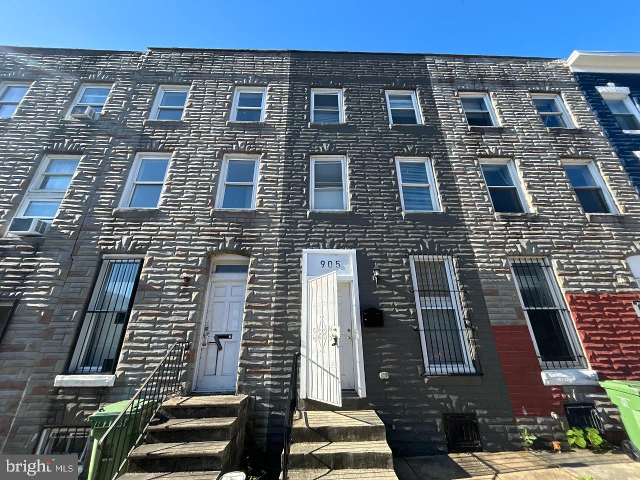 This well-maintained Federal-style townhouse, located in the desirable Harlem Park subdivision, offers a harmonious blend of classic charm and modern convenience. Built in 1920, this residence features four spacious bedrooms and two full bathrooms, making it an ideal choice for those seeking both comfort and functionality. The interior showcases an inviting layout with laminate plank flooring throughout, enhancing the aesthetic appeal while ensuring durability. The kitchen, equipped with white shaker cabinetry, granite countertops and stainless-steel appliances, is designed for both culinary enthusiasts and casual dining. Recessed lighting and ceiling fans provide a warm ambiance, while the bathrooms are equipped with tub-shower combinations for relaxation. The full unfinished basement offers significant potential for customization, whether for additional living space, storage, or a home gym. The property is equipped with in-unit laundry facilities, adding to the convenience of daily living. Externally, the townhouse is complemented by well-maintained sidewalks and street lighting, enhancing the neighborhood's safety. This property is located in a vibrant community with easy access to local dining, markets and Downtown Baltimore. Don't miss this wonderful opportunity to make this home your own! Schedule a showing today.