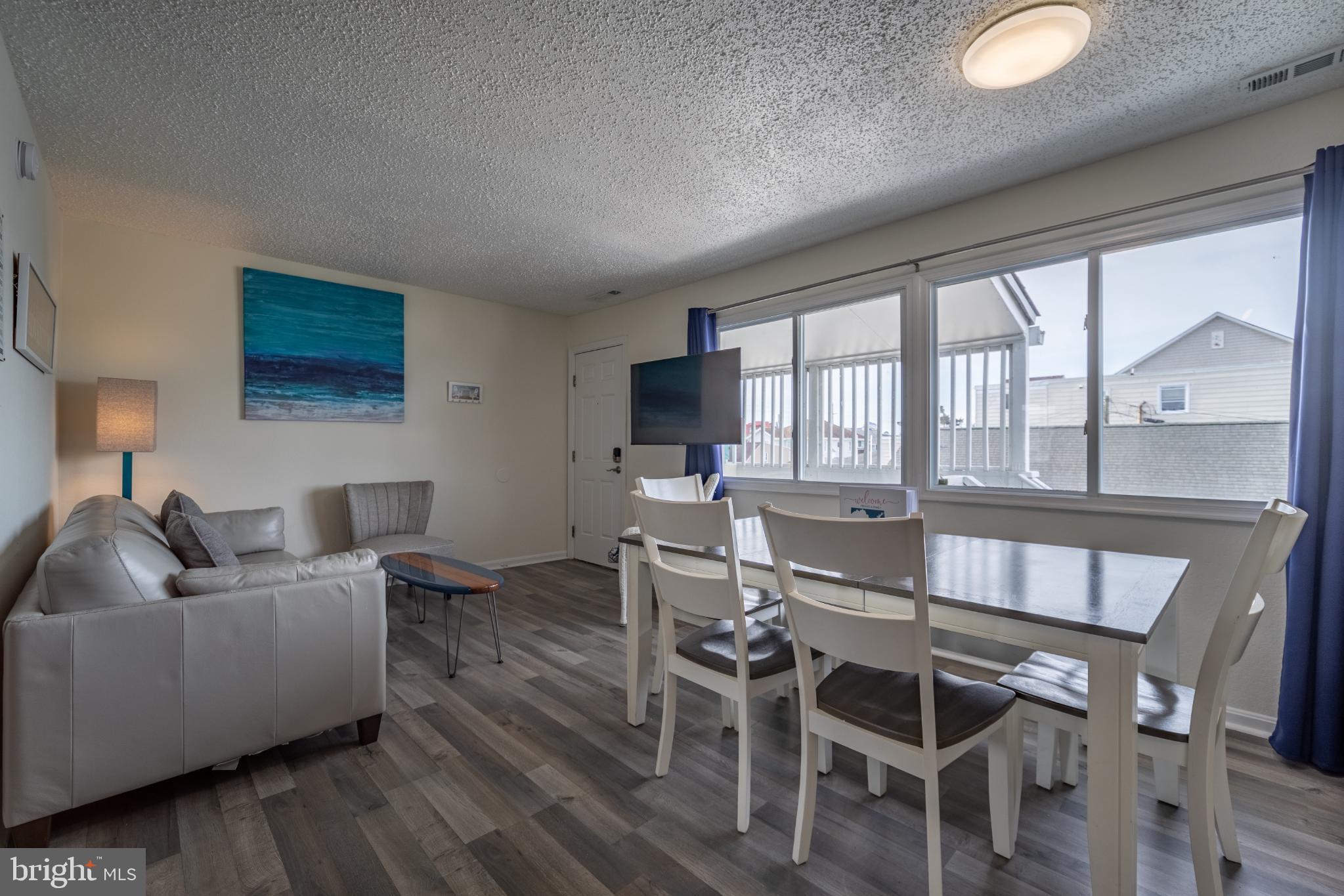 Welcome to Unit 201W in the Jocelyn Manor, a well-maintained 2 bedroom, 1 bathroom bayside interior condo located in the heart of downtown Ocean City, Maryland. This unit has generated over $23,000 in rental income for 2025, and that figure reflects the actual amount paid to the owner after rental management commissions and cleaning fees—making this a truly turn-key investment opportunity.

Inside, the condo offers a comfortable and functional layout with TVs in the living room and both bedrooms, a full kitchen featuring updated stainless steel appliances, and a dining area with seating for six—ideal for family vacations or group stays. The convenience of a washer and dryer located inside the unit adds to its appeal for both owners and guests.

The Jocelyn Manor building features an outdoor pool open during the summer months, enhancing rental desirability. Its prime downtown location puts you just a short walk to the beach and boardwalk, two blocks from the bay, and steps from popular restaurants and nightlife favorites like Pickles Pub and Pizza Mambo.

Currently operating as a successful vacation rental, this unit is professionally managed by OC Beach Vacations and proudly holds “Guest Favorite” status on Airbnb, boasting an impressive 4.94 average rating across 47 reviews. OC Beach Vacations is happy to continue management for the new owner, allowing you to retain the existing reviews, guest history, and momentum of a proven rental from day one.

Whether you’re looking for a strong investment, a personal getaway with income potential, or both, Unit 201W offers location, performance, and immediate upside in one of Ocean City’s most sought-after areas.