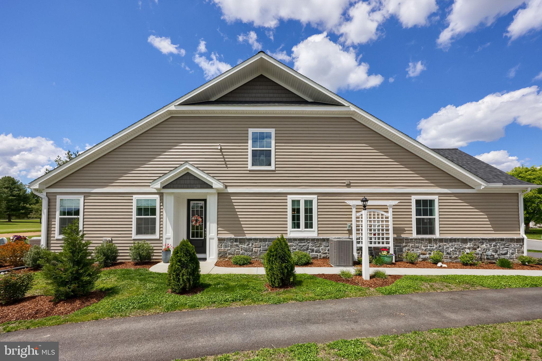 Welcome to effortless living in the highly sought-after Sawgrass Section of Crossgates in Millersville—where comfort, convenience, and low-maintenance living come together beautifully. Designed with downsizers, empty nesters, and those seeking a simplified lifestyle in mind, this thoughtfully crafted semi-detached home offers the ease of main-floor living paired with the space and flexibility you still desire. With 1,532 square feet on the main floor and additional 204 Sqft that will be finished on the second floor with an additional 120 Sq.ft for storage, a two-car garage, and a layout that lives larger than expected, this home is truly move-in ready and has been lovingly maintained with attention to every detail.

The heart of the home features an open-concept design highlighted by a warm and inviting great room with a gas fireplace, flanked by custom-built benches and enhanced by elegant crown moulding. The kitchen is both functional and refined, offering quartz countertops, a ceramic tile backsplash, upgraded stainless steel appliances with a striking range hood, and luxury vinyl plank flooring that flows seamlessly throughout the main living areas. The first-floor primary suite provides a peaceful retreat with a beautifully appointed bathroom featuring ceramic tile flooring and a walk-in tile shower, while an additional bedroom and full bathroom on the main level offer flexibility for guests or a home office. Upstairs, a potential third bedroom and unfinished storage space provide room to grow, create, or simply keep life organized.

Step outside and enjoy one of the home’s most captivating features—a private patio overlooking the 9th fairway of Crossgates Golf Course, complete with tranquil pond views. Professionally designed landscaping and a privacy wall create a serene outdoor setting perfect for relaxing or entertaining. This home truly stands apart from new construction, offering not only premium finishes but also thoughtful upgrades already in place—including upgraded lighting, blinds throughout, and carefully curated enhancements that make daily living more comfortable and complete.

Enjoy a low-maintenance lifestyle with an HOA that takes care of snow removal and lawn mowing, allowing you more time to enjoy what matters most. The Crossgates community offers a vibrant yet peaceful setting with walking paths, a ball field, tennis courts, and close proximity to local dining, shopping, and everything Millersville and Lancaster County have to offer.