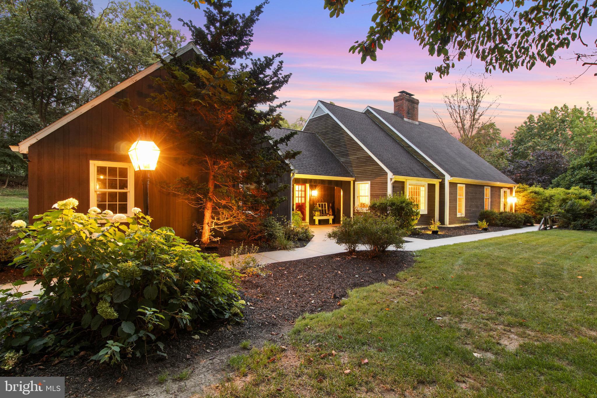 Your Private Resort Awaits: an architecturally designed sanctuary on 4.91 acres in Central York School District, and nestled amidst tranquility in an incredibly convenient East End location. Discover a rare opportunity to own an architecturally designed estate that masterfully balances exquisite beauty, unparalleled privacy, and everyday convenience. This expansive 5,949-square-foot residence offers a unique lifestyle akin to your own private resort, set on a breathtaking 4.91-acre parcel bordered by mature trees and woods that create a serene, secluded atmosphere and offering potential for a family compound, subdivide and sell off lots or maintain the secluded estate. Boasting five bedrooms, four full bathrooms, and two half bathrooms, the home provides ample space for family, guests, and modern living, including the ease of single-floor living with a luxurious primary bedroom suite conveniently located on the first floor. Three fireplaces add warmth and character throughout the thoughtfully designed interior. Enhance your productivity in the dedicated separate office space with its own private entrance, offering a quiet and inspiring environment for remote work, creative pursuits, or personal projects. The office space also features a full bathroom and extra bedroom/flex space for an in-law suite or caretaker quarters. The basement provides additional functional space, including a dedicated workout room, a private office area, and a versatile shop - perfect for hobbies, storage, or creating your dream home gym. Step outside to an expansive outdoor oasis designed for unforgettable gatherings with friends and family, from summer barbecues to relaxing evening swims. While a separate two-story, one-car garage offers incredible potential as a workshop, studio, she-shed, or sophisticated retreat. Situated within two miles of Central High School, Central Middle School, the Galleria Mall, and the vibrant East End, this exceptional property allows you to enjoy the tranquility of a sprawling estate while remaining mere minutes from top-rated schools, shopping, dining and Route 30 making it a convenient trip across the Susquehanna River to Lancaster. This is more than just a home - it is a lifestyle offering unparalleled privacy, convenience, and the ultimate in sophisticated living. Call today to schedule your private tour!