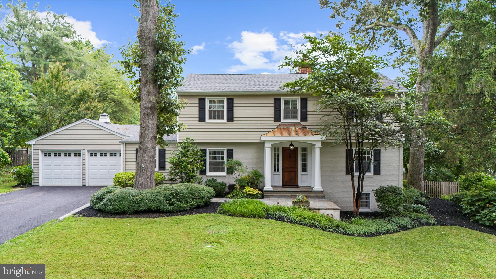 Welcome to 305 Saint Ives Drive, a beautifully maintained 5-bedroom, 3-full-bath home offering the perfect blend of timeless charm, modern updates, and sought-after community amenities. Situated in the heart of Chartwell, this spacious residence provides exceptional living spaces both inside and out. A charming covered portico leads to the welcoming foyer, setting the tone for the warmth and character found throughout the home. The formal living room is filled with natural light from expansive windows and is anchored by a cozy fireplace. Opposite, a flexible main-level room can serve as a private office, guest suite, or additional bedroom and is conveniently paired with a renovated full bath. The kitchen has been thoughtfully updated with new lighting, recessed lighting, a new refrigerator, extensive refinished cabinetry, and ample storage, making it as functional as it is inviting.  A main-level office was converted into a fifth bedroom with its own exterior entrance, offering versatility for multigenerational living, guests, or a private workspace. Outdoor living shines with an expanded Pennsylvania bluestone patio, outdoor fireplace, and backyard lighting, creating the perfect setting for entertaining or relaxing evenings at home. Upstairs, spacious bedrooms provide comfortable accommodations, while the renovated primary and hall bathrooms offer modern finishes and timeless appeal.  The finished basement has been thoughtfully renovated with new flooring, built-ins, recessed lighting, and fresh paint, creating flexible living space for recreation, work, or guests. Recent improvements give buyers peace of mind, including a new roof (2023), replacement HVAC systems and outdoor AC units (2021/2022), renovated wood burning fireplace, refinished hardwood floors upstairs, updated lighting throughout, fresh interior and exterior paint, new washer and dryer, and extensive landscaping. Residents have the opportunity to join Chartwell Golf & Country Club just steps away or enjoy immediate access to Saint Andrews Swim & Tennis Club, offering an exceptional lifestyle with golf, swimming, tennis, and community activities just moments from home. This is a rare opportunity to own a thoughtfully updated home in one of Severna Park's most desirable communities.