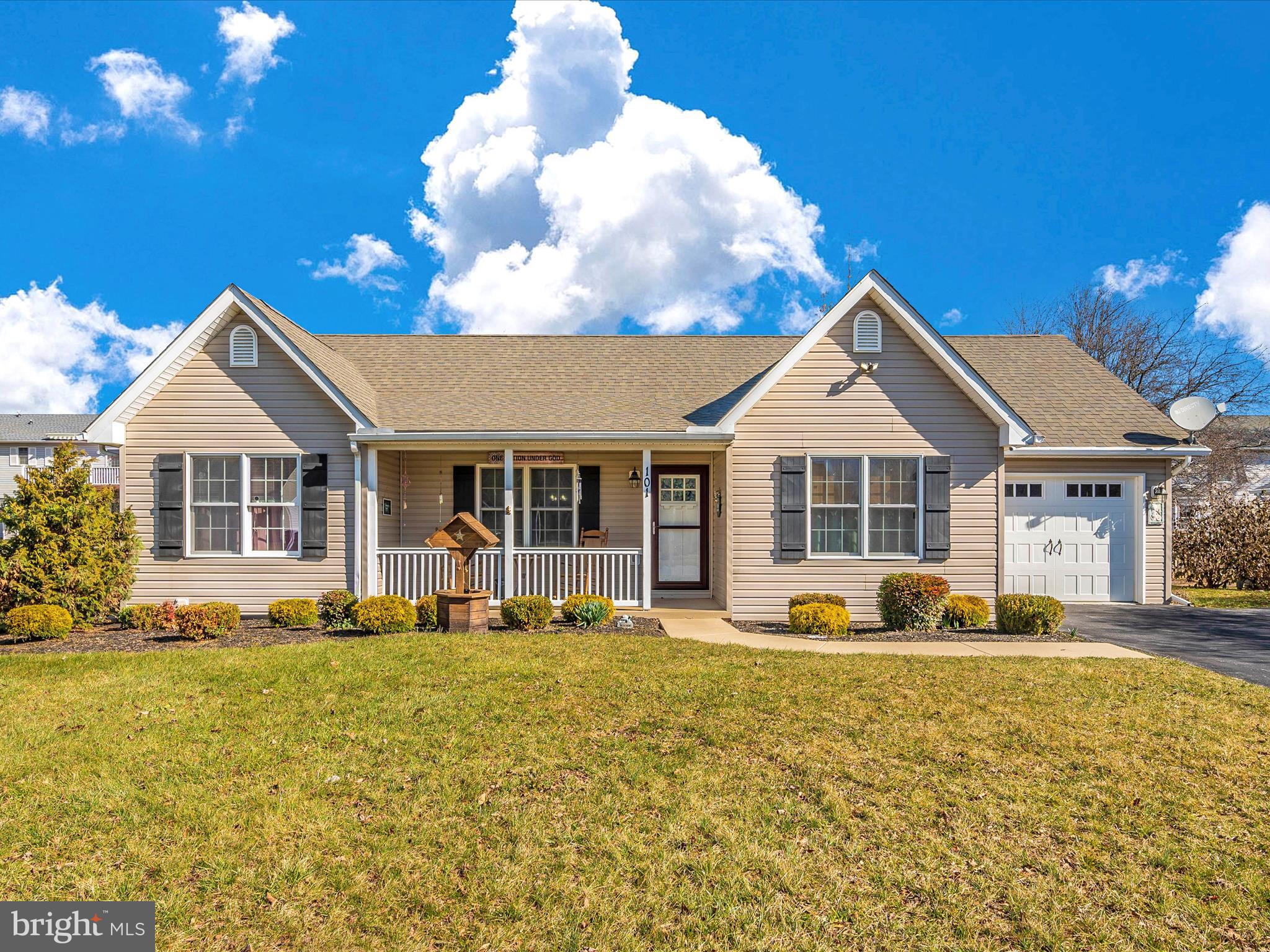 Discover the comfort of easy living at 101 Oriole Ln, a captivating 3-bedroom, 2-bathroom rancher nestled in the highly sought-after Spring Mills community. Immerse yourself in the welcoming open living space adorned with an expansive cathedral ceiling and a wall-mount fireplace, complemented by inviting laminate flooring that effortlessly flows through most of the home. The kitchen, upgraded with contemporary flair, features a stylish tile backsplash, sleek granite counters, and modern stainless steel appliances. Both bathrooms exude sophistication with refined granite vanity tops and tasteful ceramic tile accents. Check out that primary bathroom, WOW! Indulge in the bonus 4 seasons room, boasting a snug gas stove. This space is perfect for enjoying the sunlight no matter the season! The 4 seasons room leads you to a secluded patio and a meticulously landscaped backyard, surrounded by trees for added privacy. Recent updates, including a new HVAC unit in February 2023, fresh paint touch-ups, and a 7-year-old roof, ensure a worry-free lifestyle. Community amenities such as a refreshing pool, tennis court, and scenic walking trails elevate the allure of 101 Oriole Ln, offering not just a home but a lifestyle tailored for simplicity, comfort, and ease. Don't miss the opportunity to experience the essence of inviting, practical, and serene living—schedule your viewing today and make 101 Oriole Ln your haven.